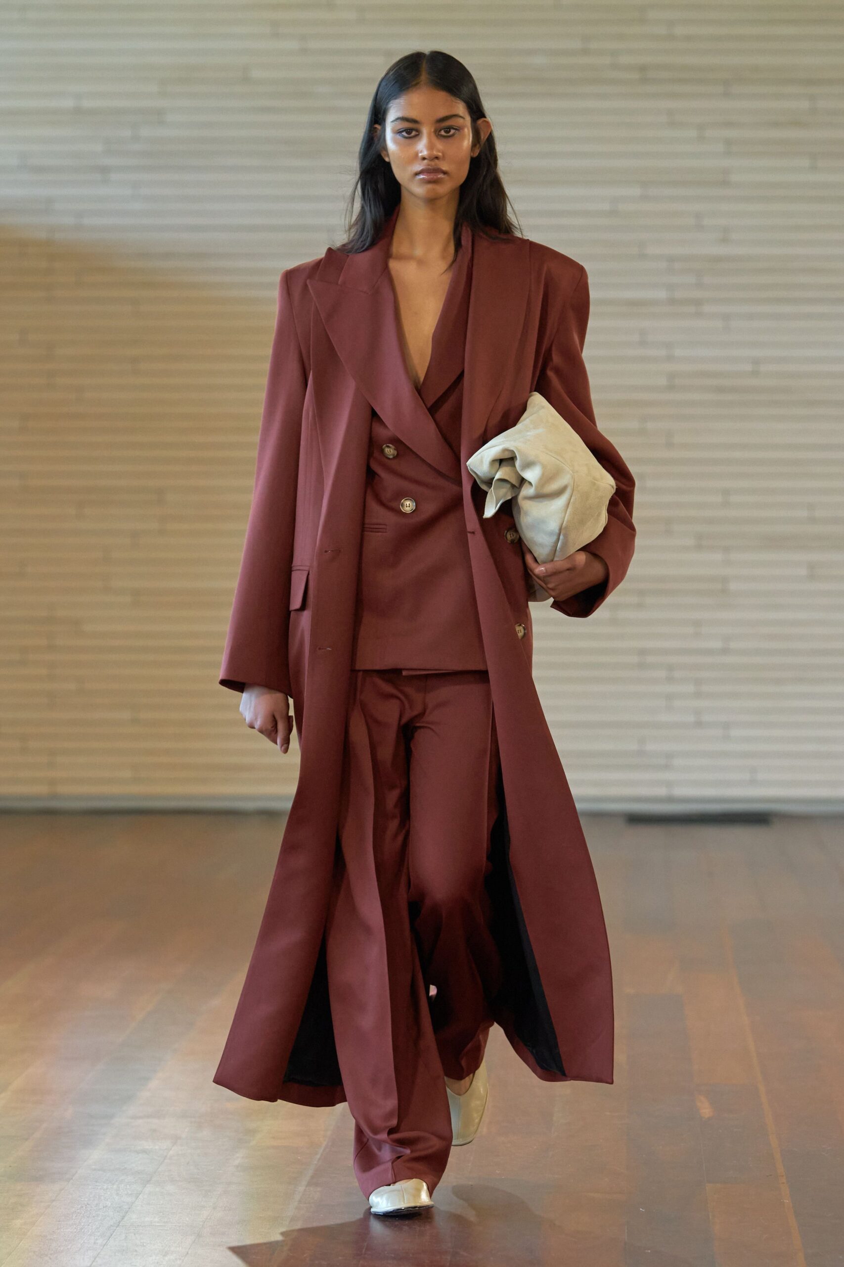 maroon long-sleeve v-neck tailored suit