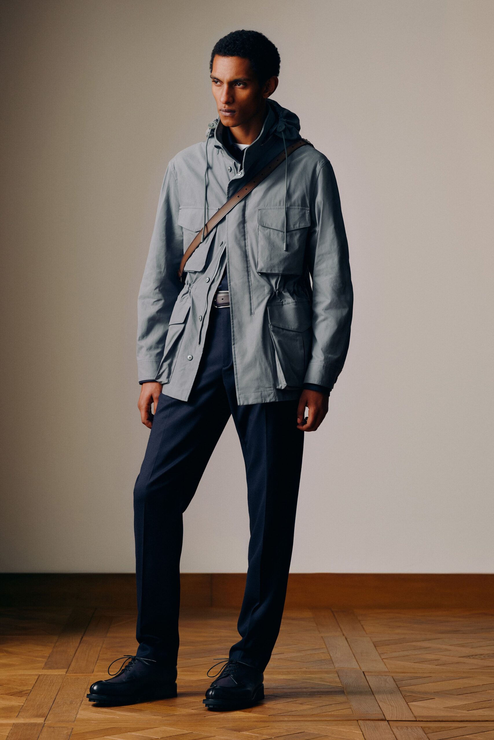gray relaxed jacket with navy pants