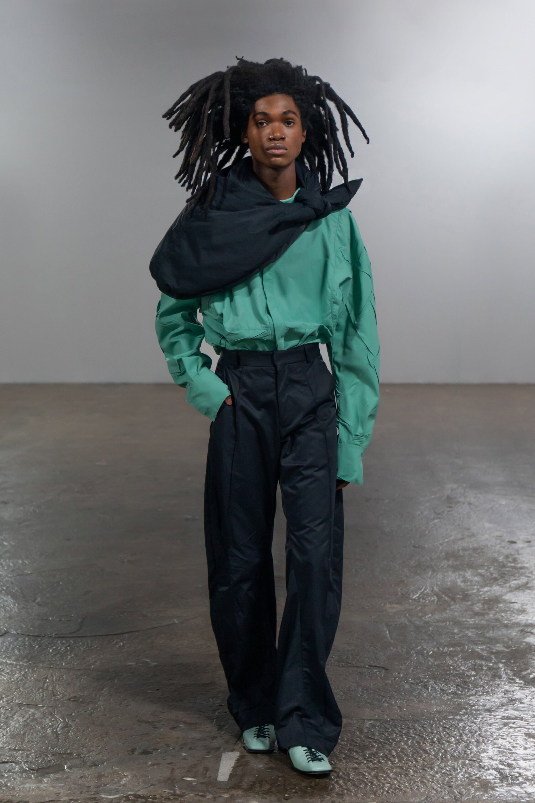 green relaxed shirt with black pants