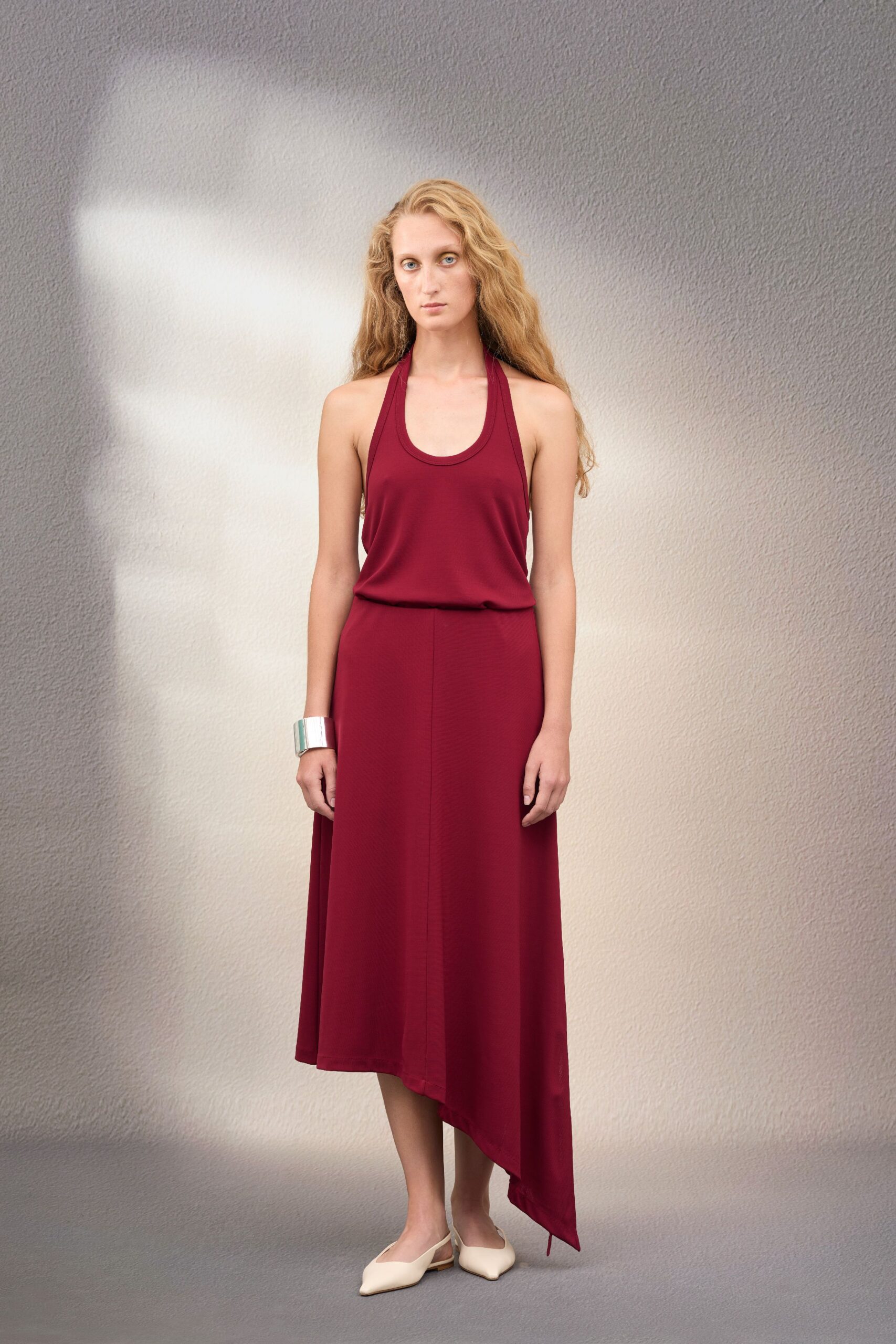 red halter midi dress with beige shoes