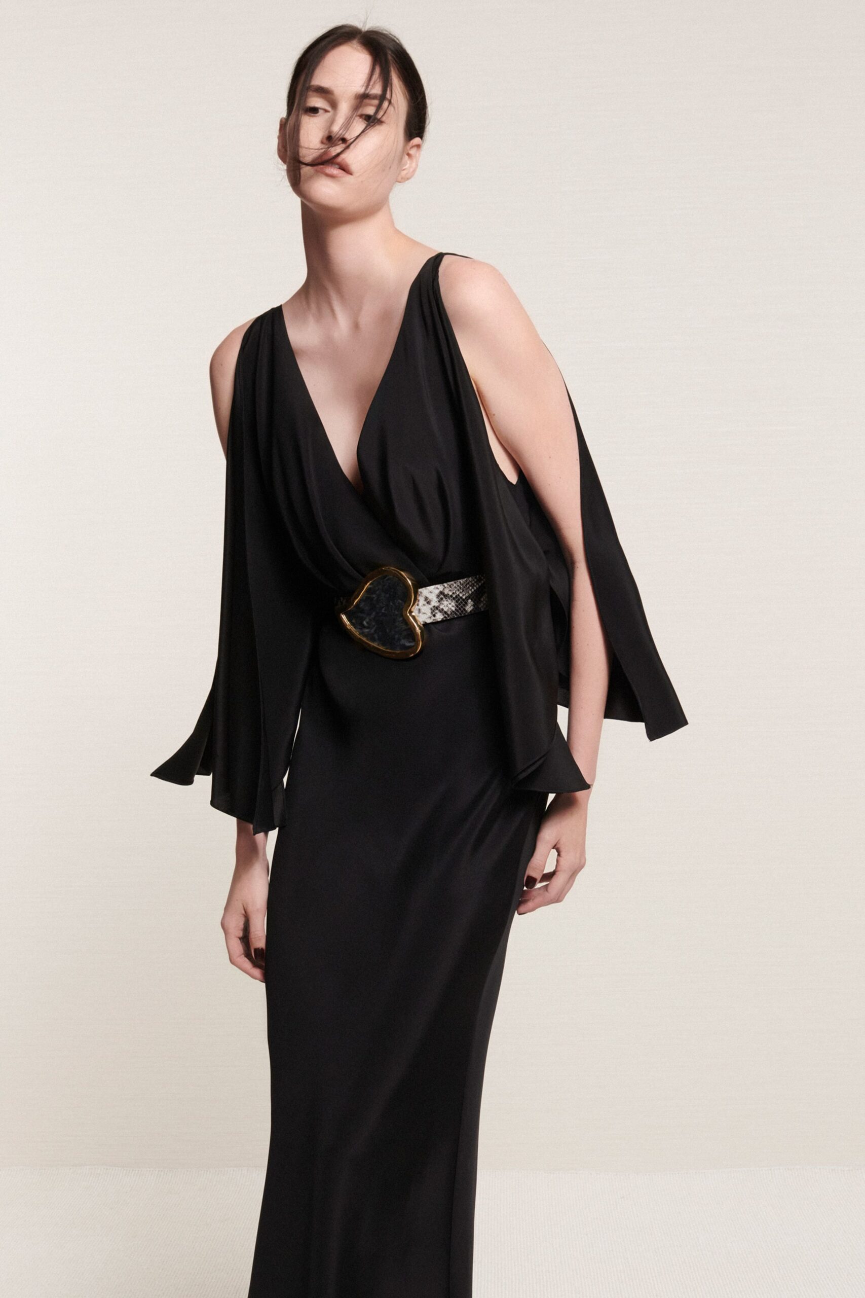 black silk draped gown with belt