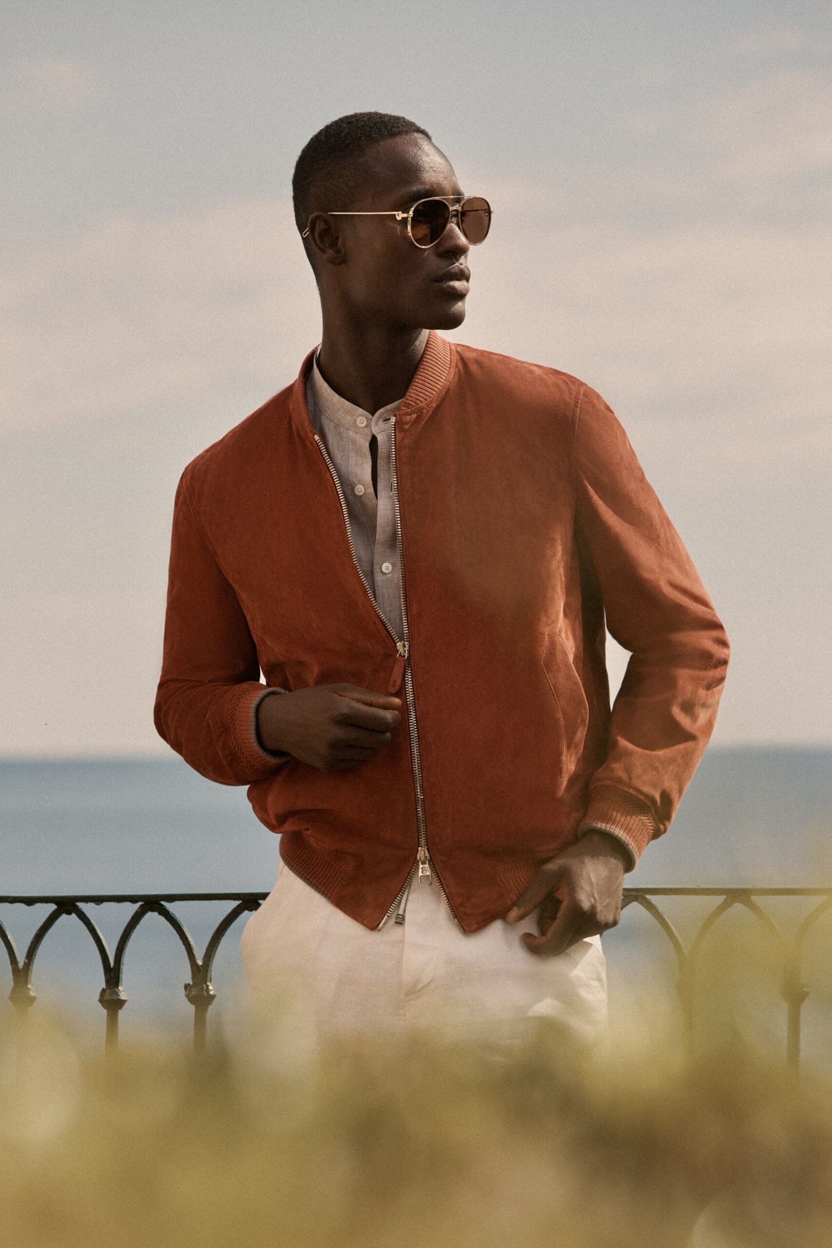 red suede long-sleeve collared fitted jacket