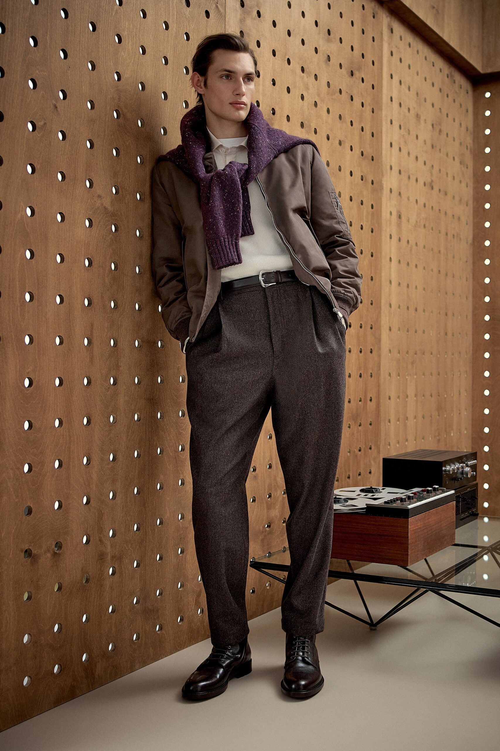 brown jacket with purple sweater