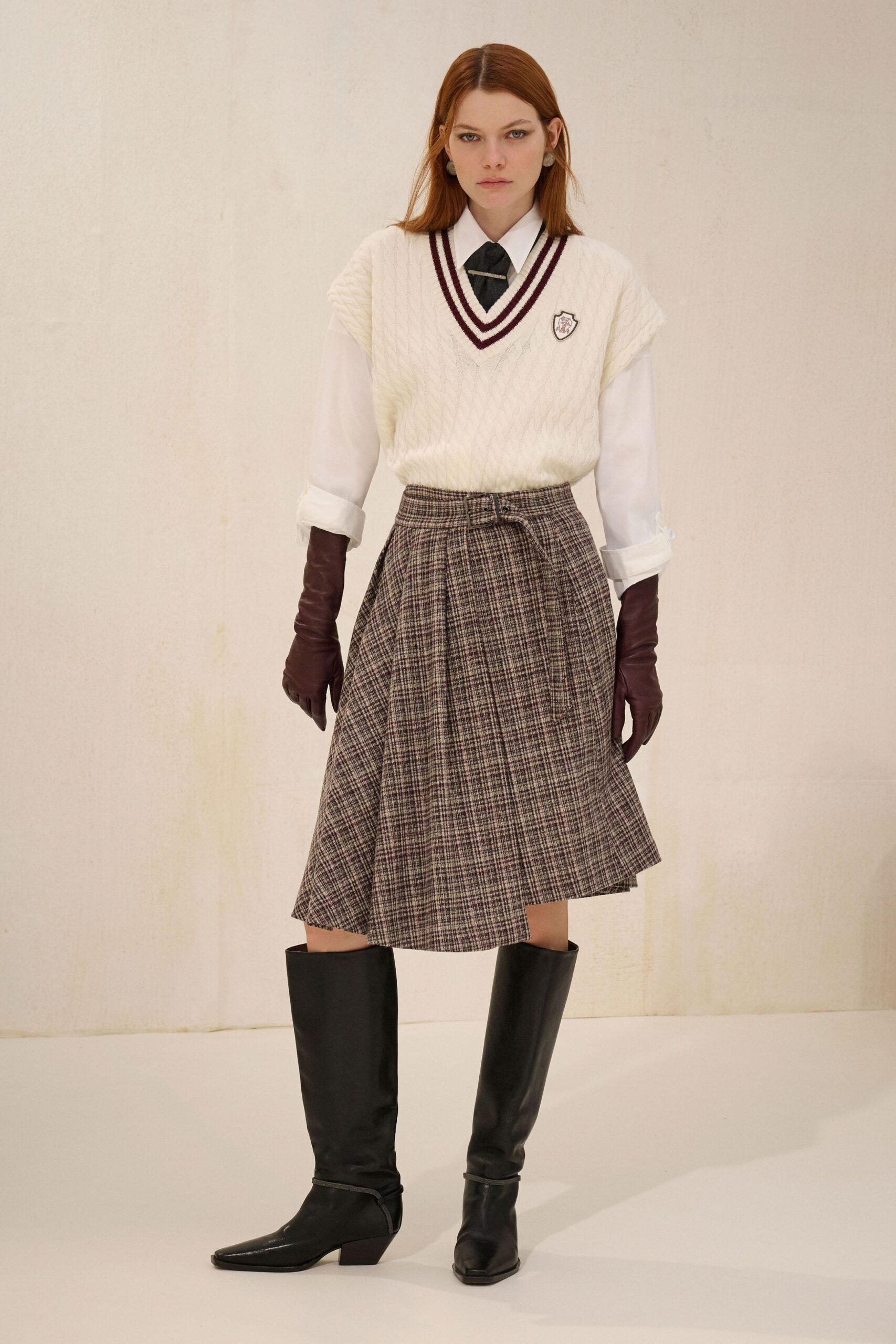 white cotton sleeveless v-neck fitted pleated sweater
