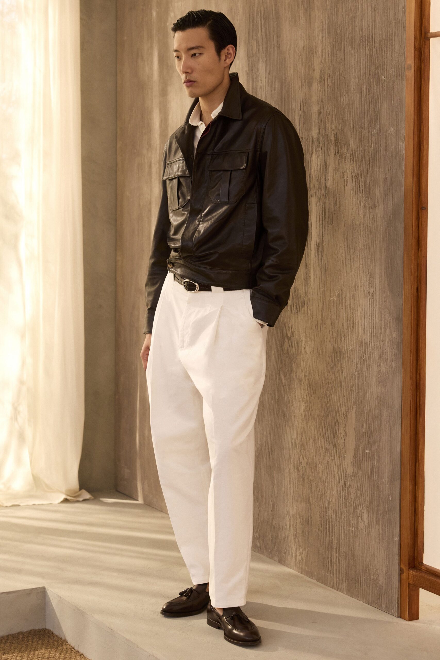 black leather long-sleeve collared structured pockets buttoned jacket