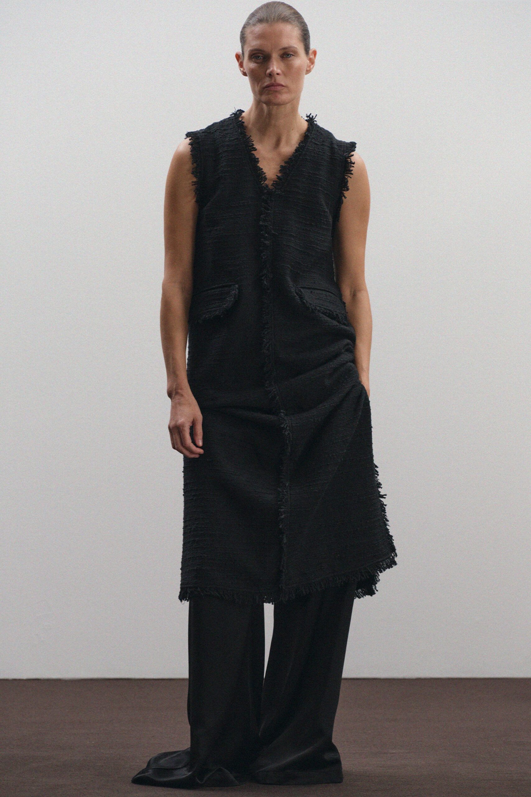 black relaxed midi dress with pockets