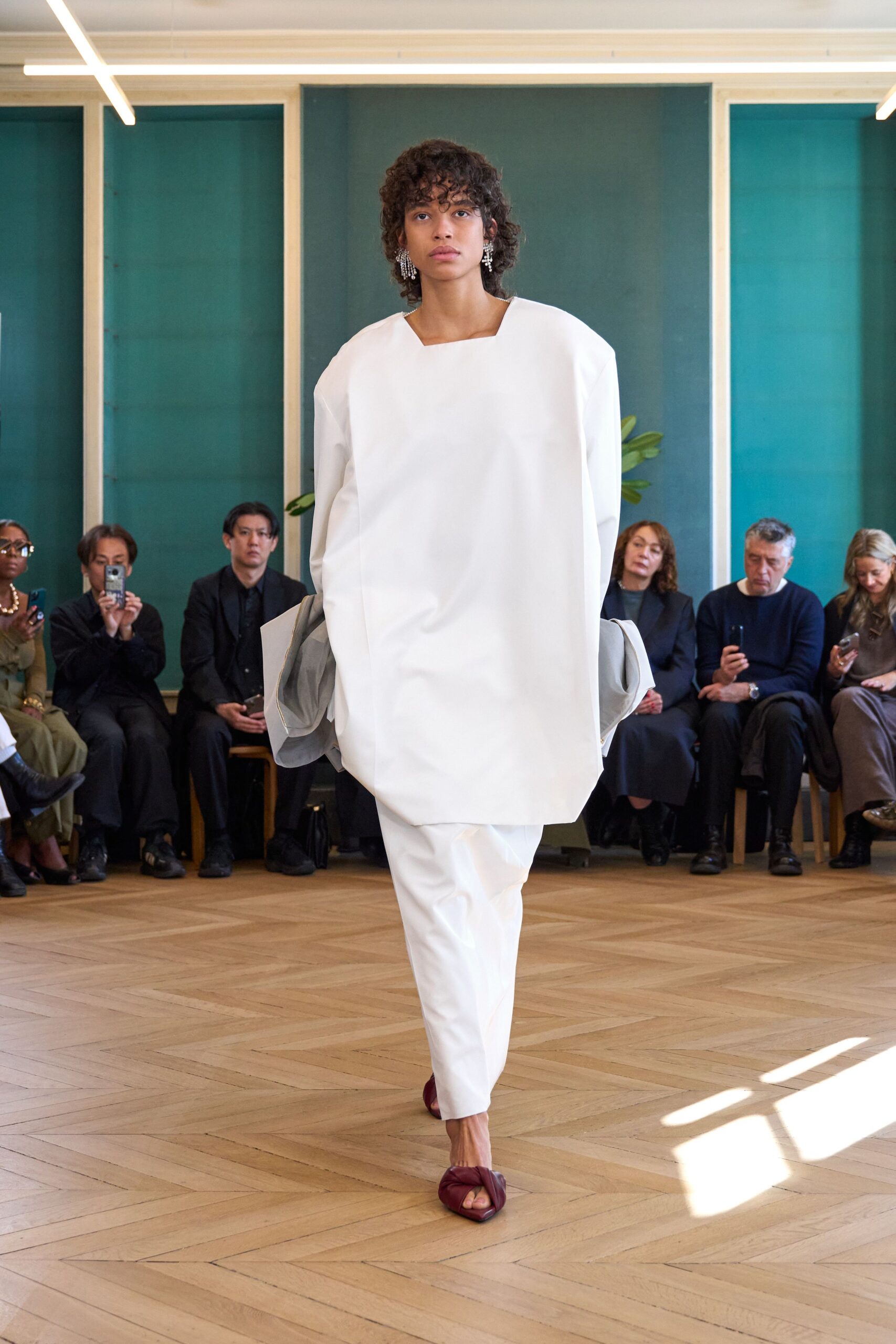 oversized white top with relaxed pants