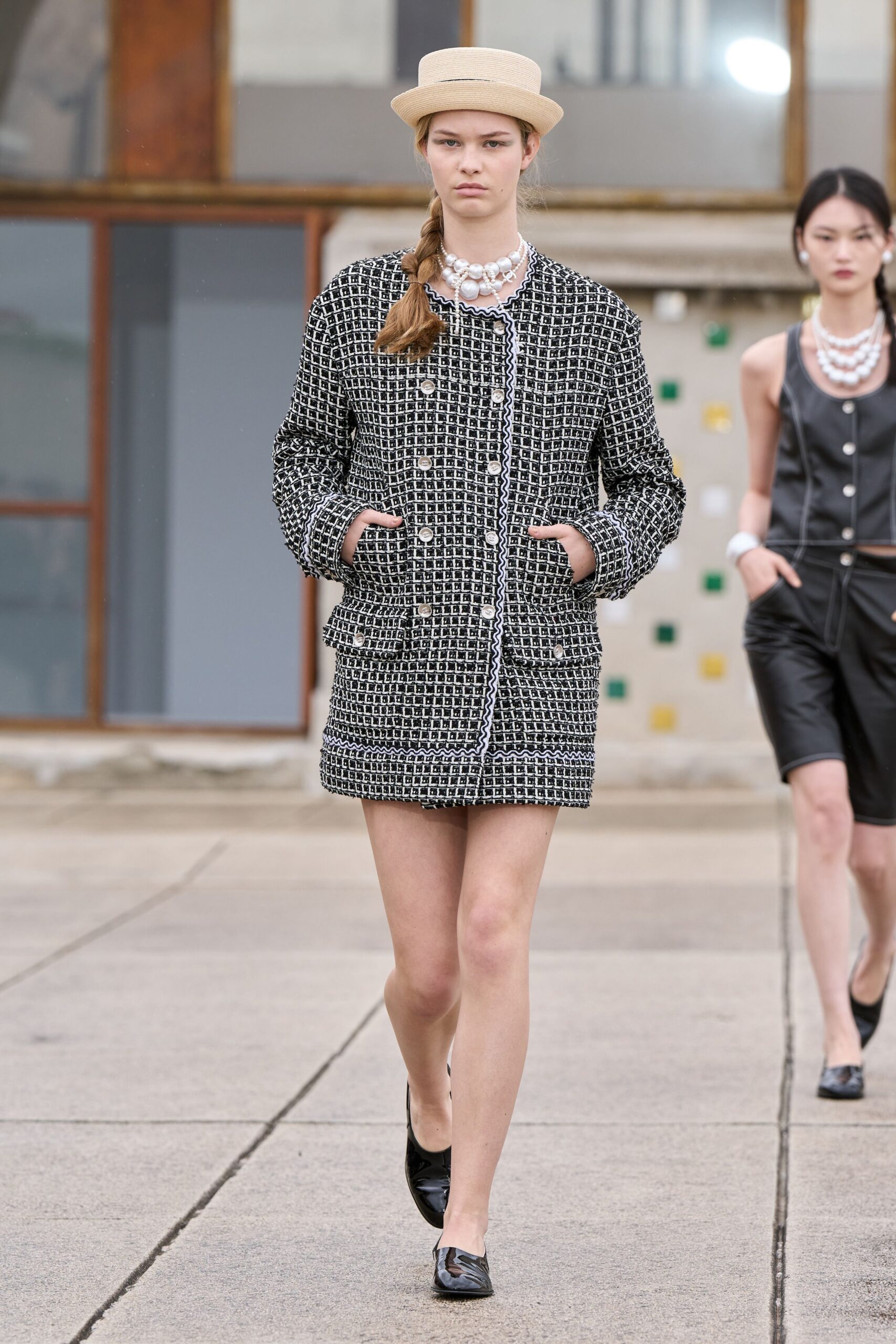 black cotton long-sleeve collared fitted buttoned pockets coat