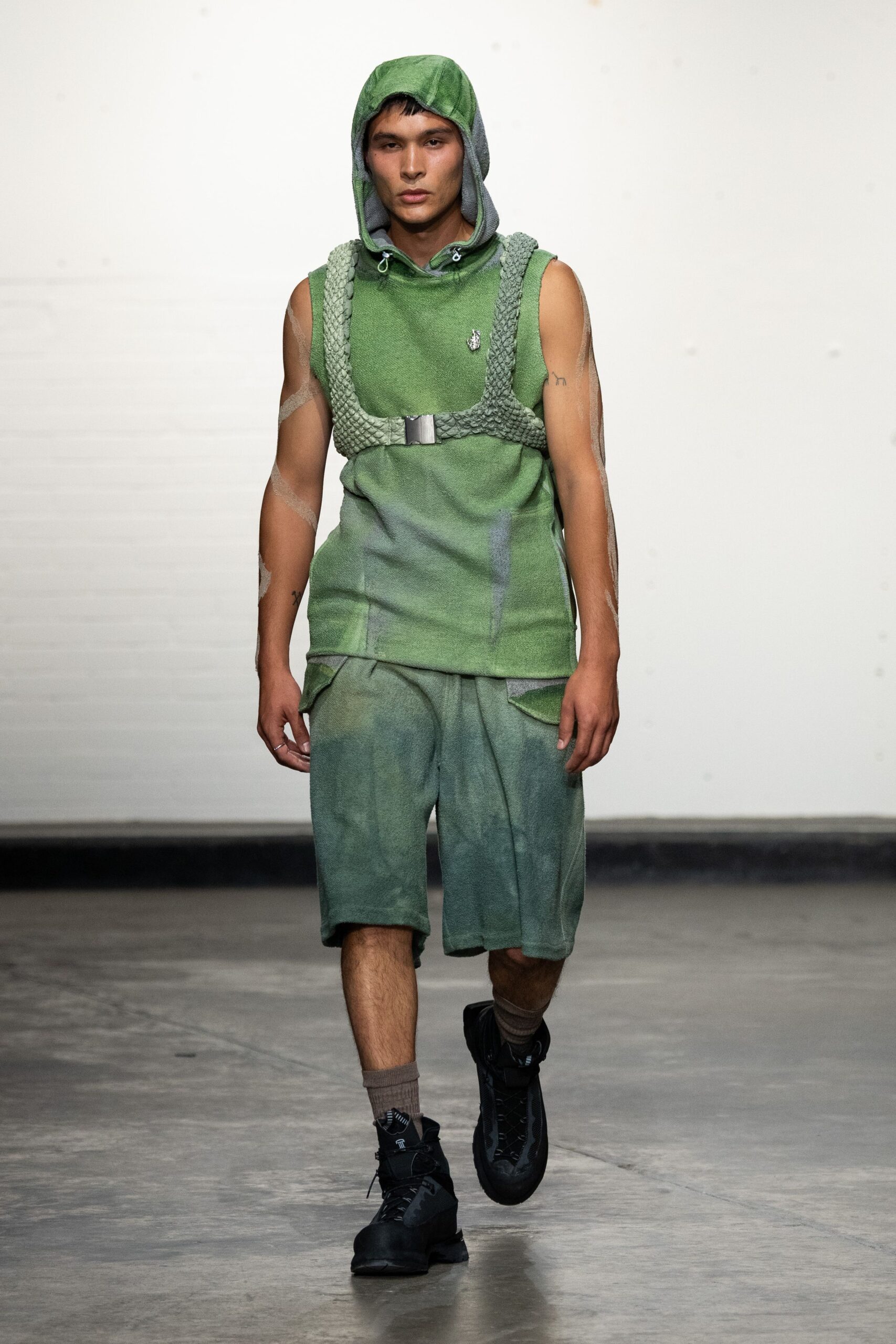 green sleeveless hoodie and shorts