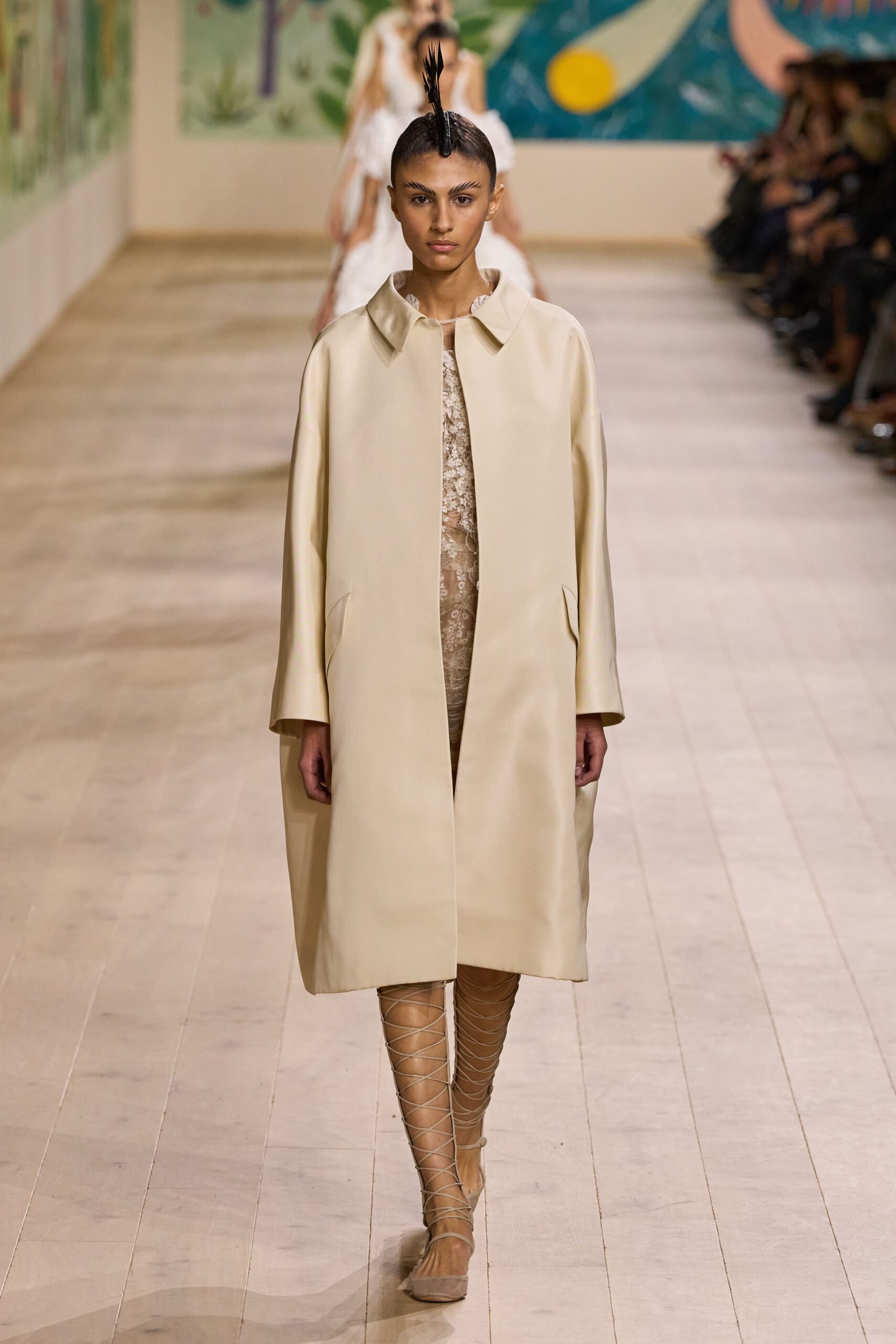 beige coat over ivory lace dress