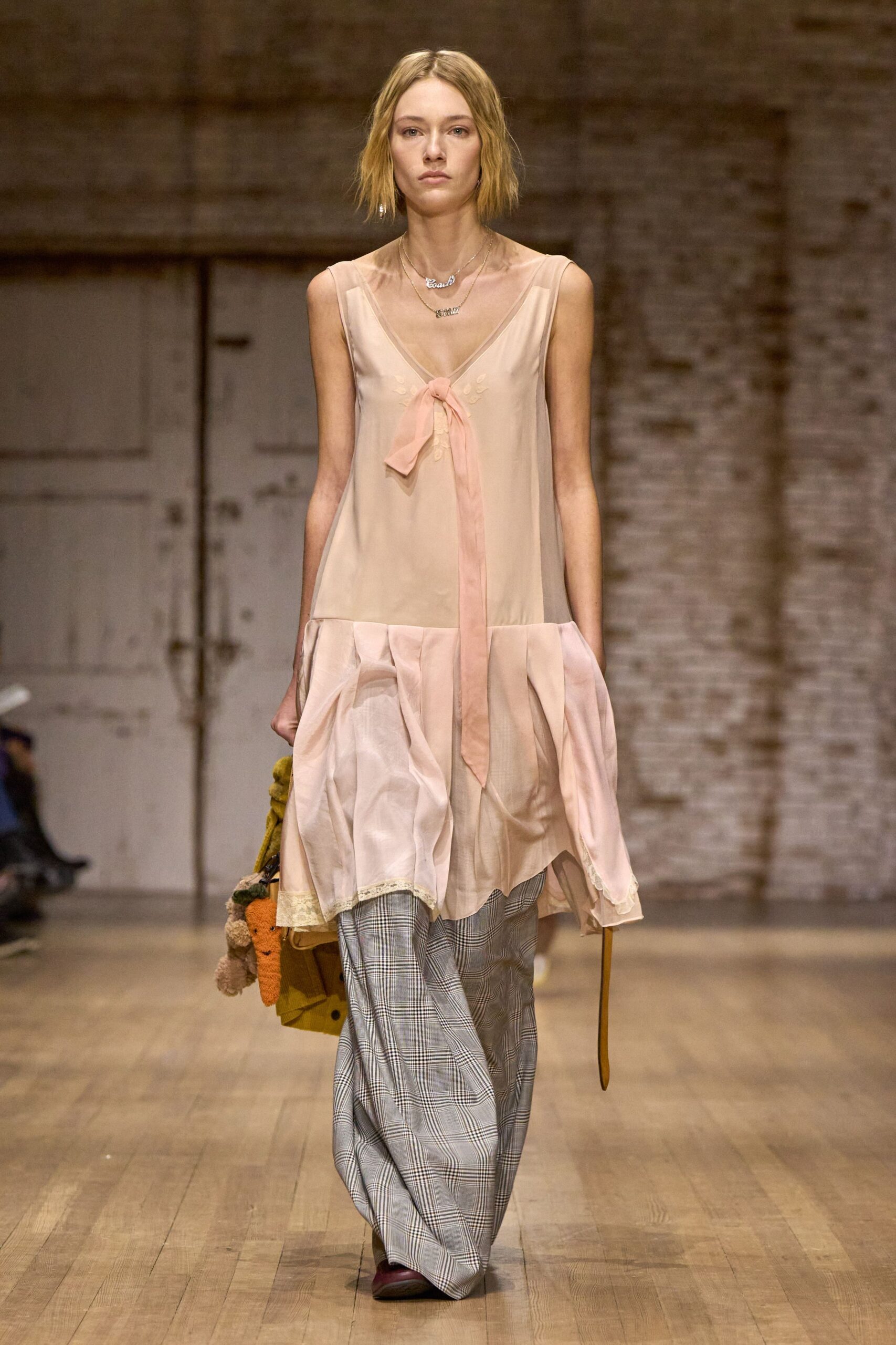 pink silk tiered dress with checked pants