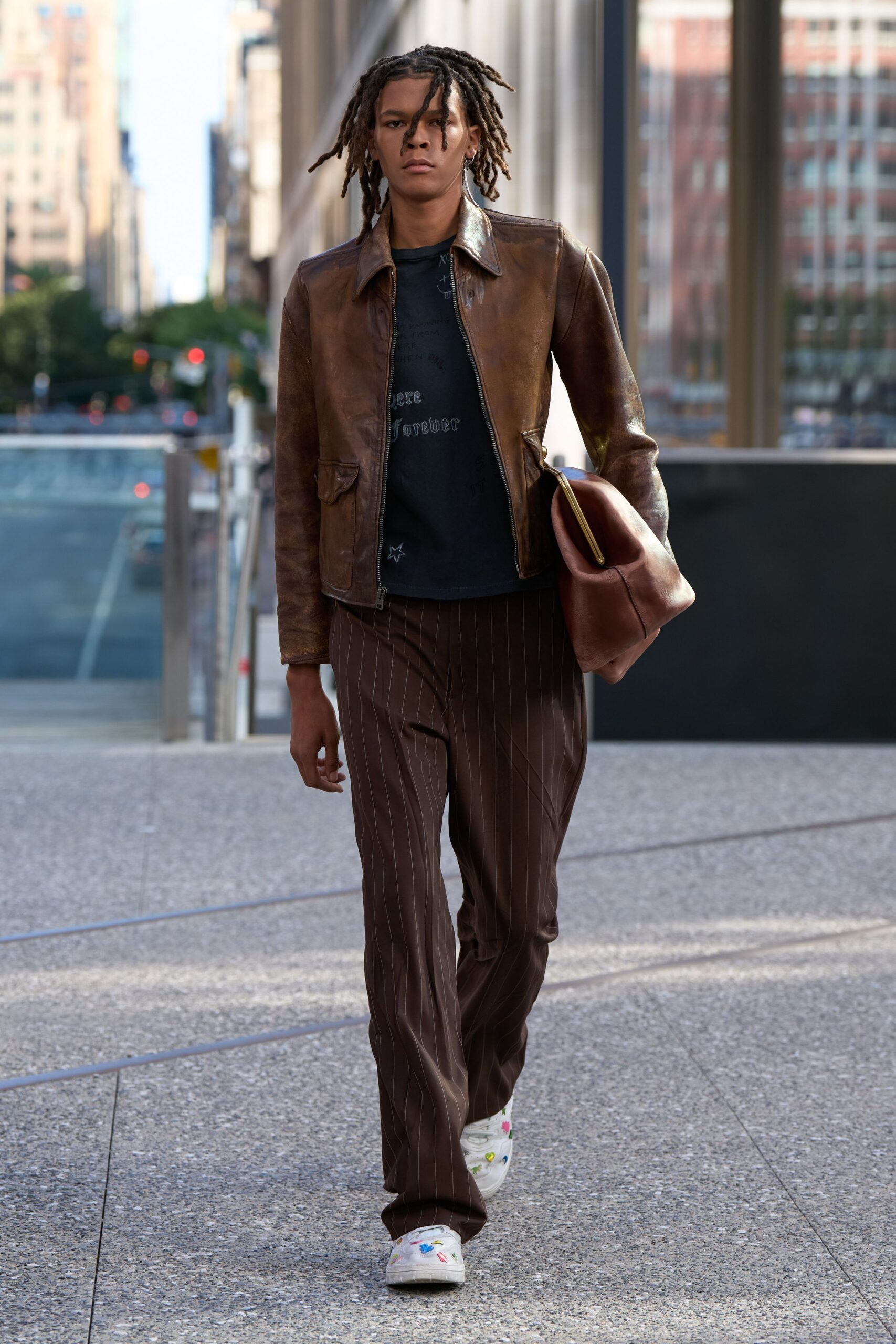brown leather jacket with black t-shirt