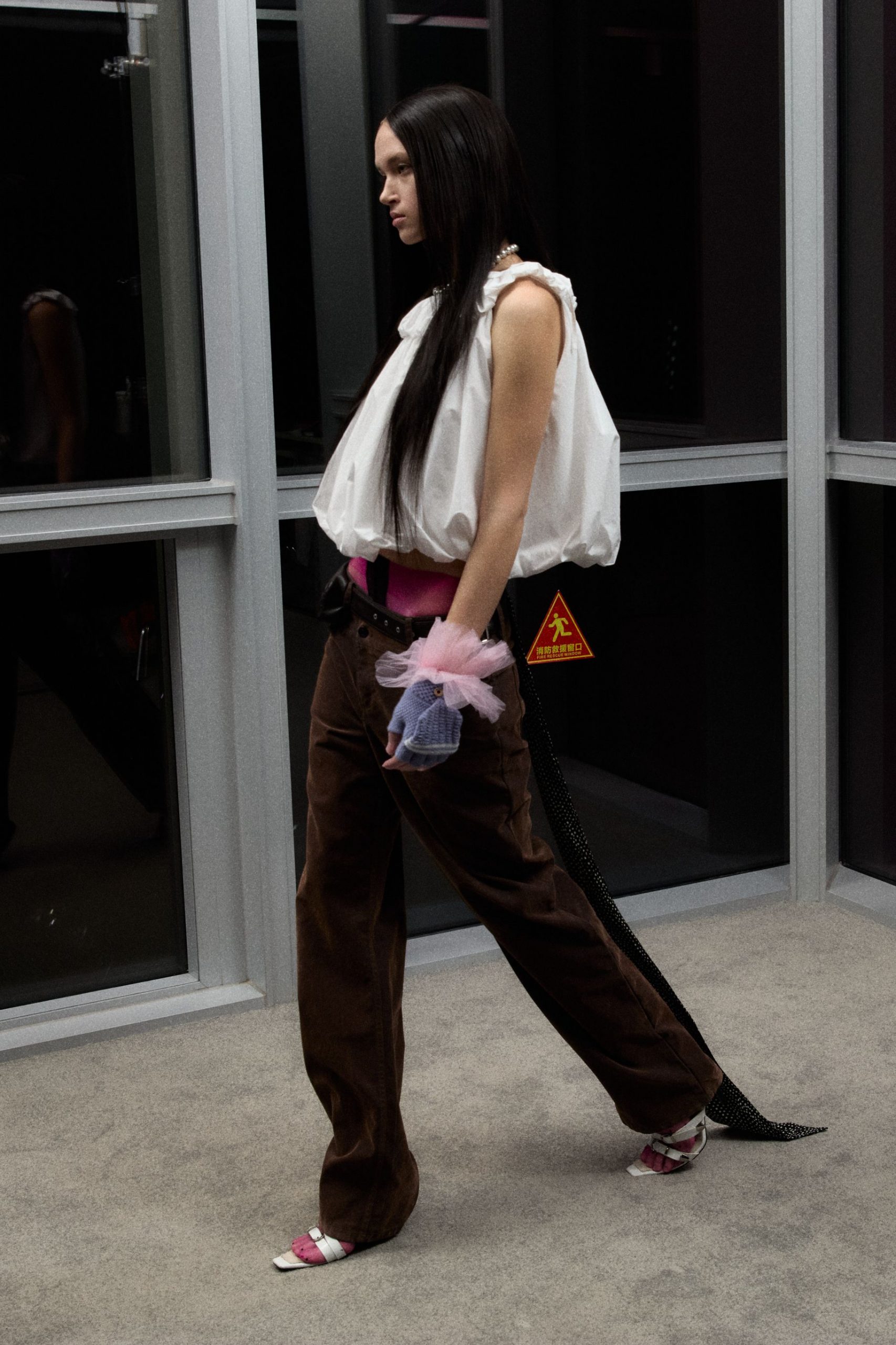 white relaxed top with brown pants