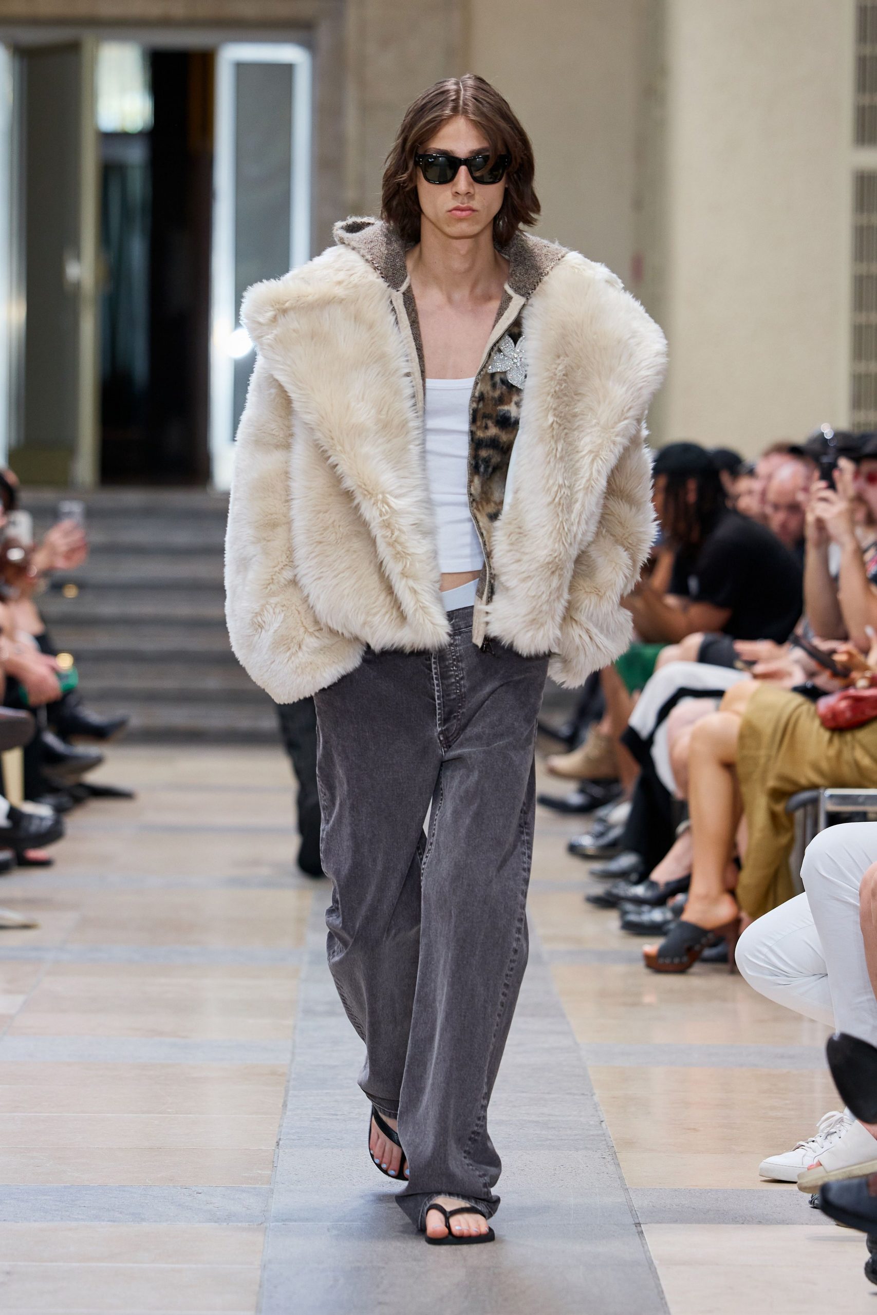 oversized faux-fur coat with relaxed denim pants