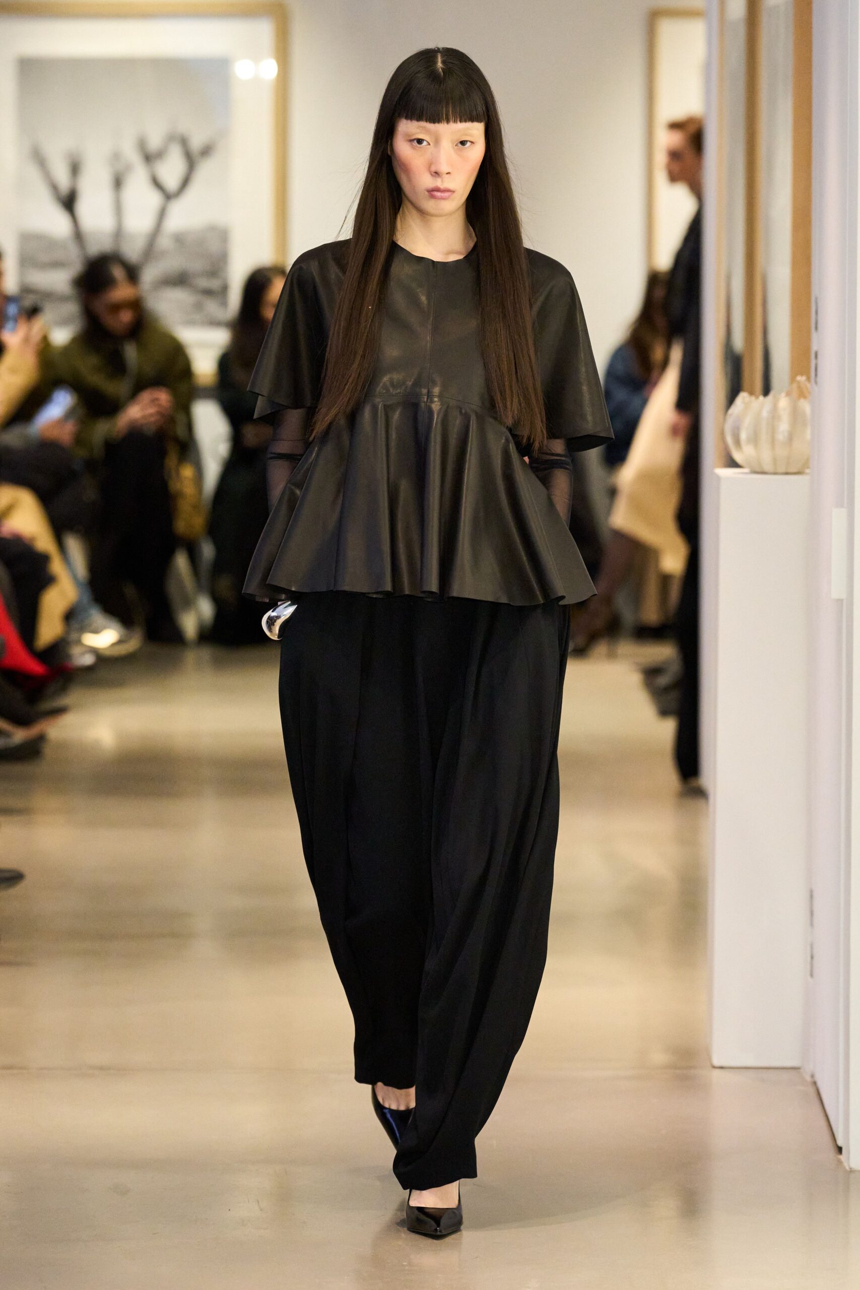 black leather short-sleeve high-neck relaxed flared top