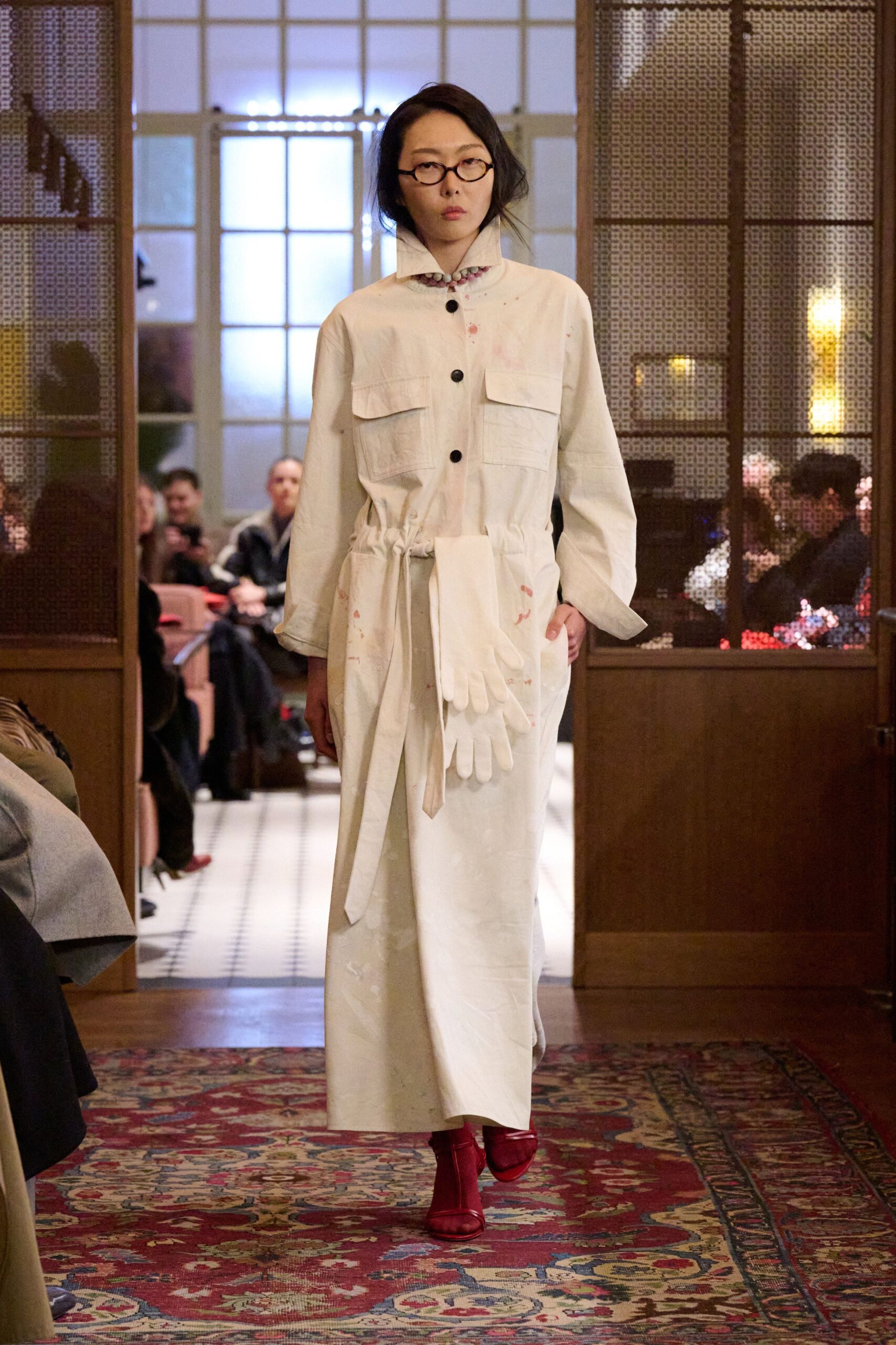 white relaxed long-sleeve dress with red boots