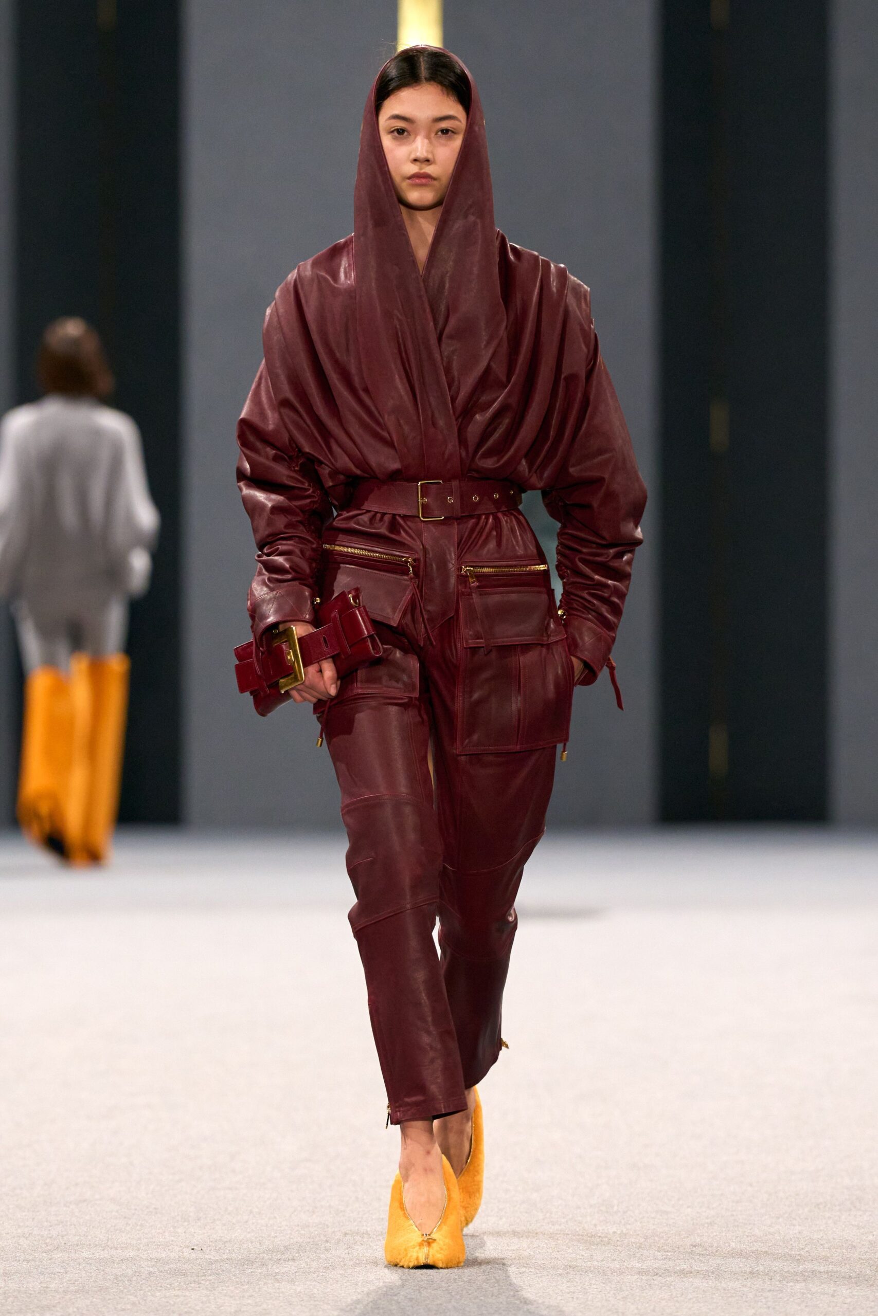 maroon leather long-sleeve hooded fitted zippered pockets jumpsuit