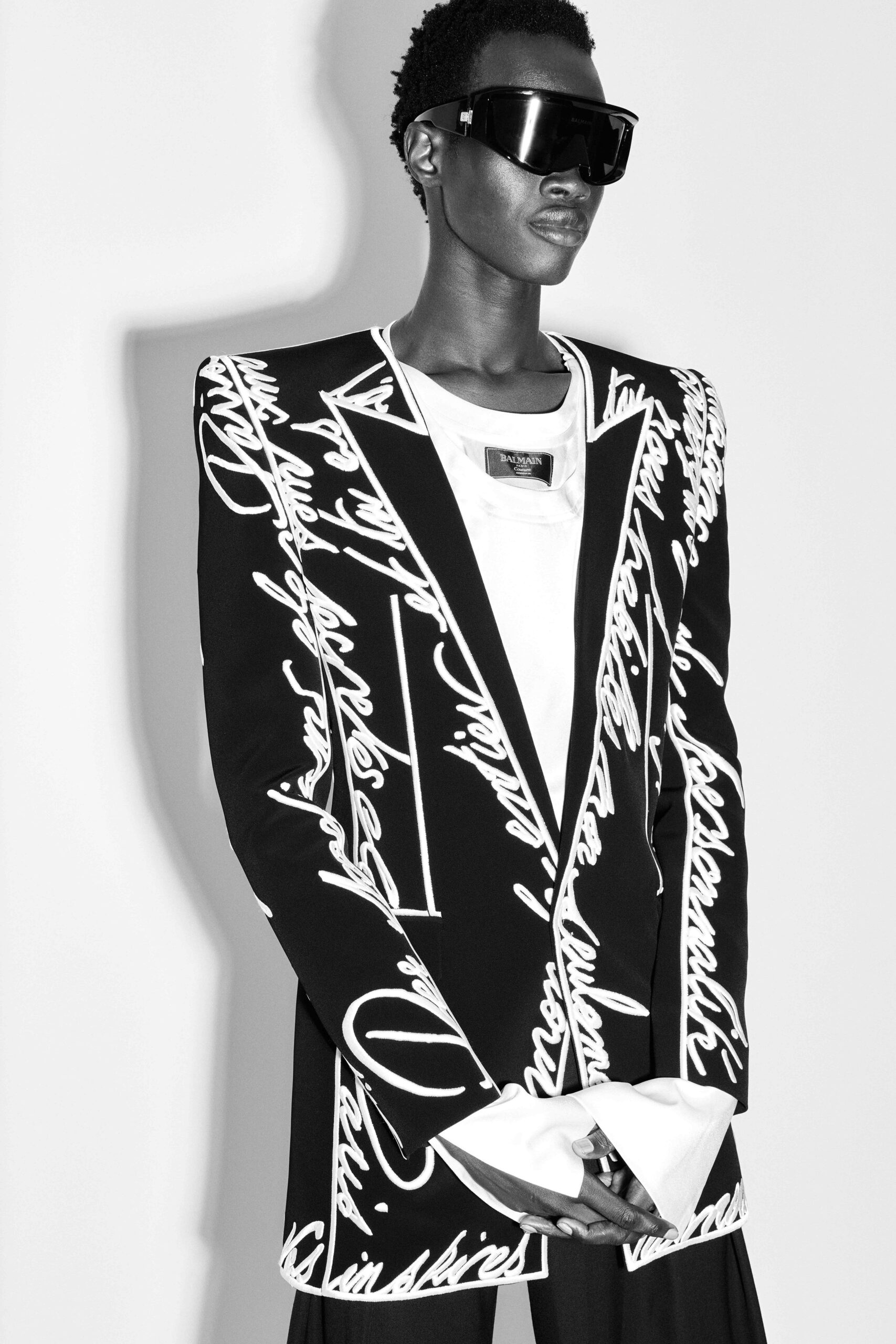 black cotton long-sleeve collared structured printed blazer
