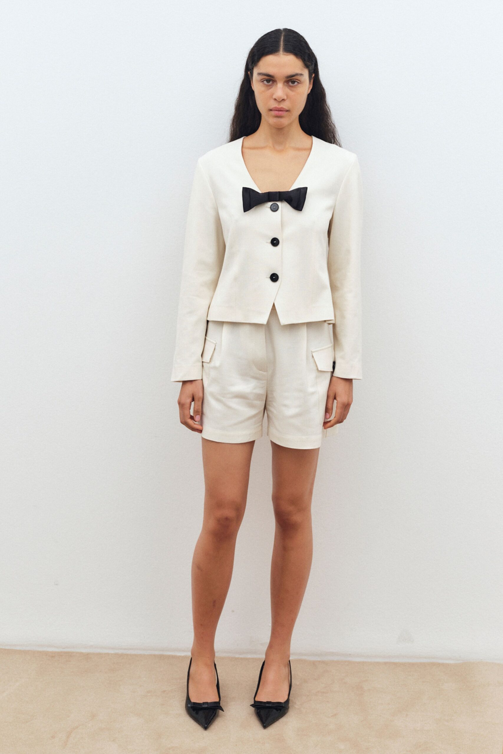 white tailored blazer with shorts