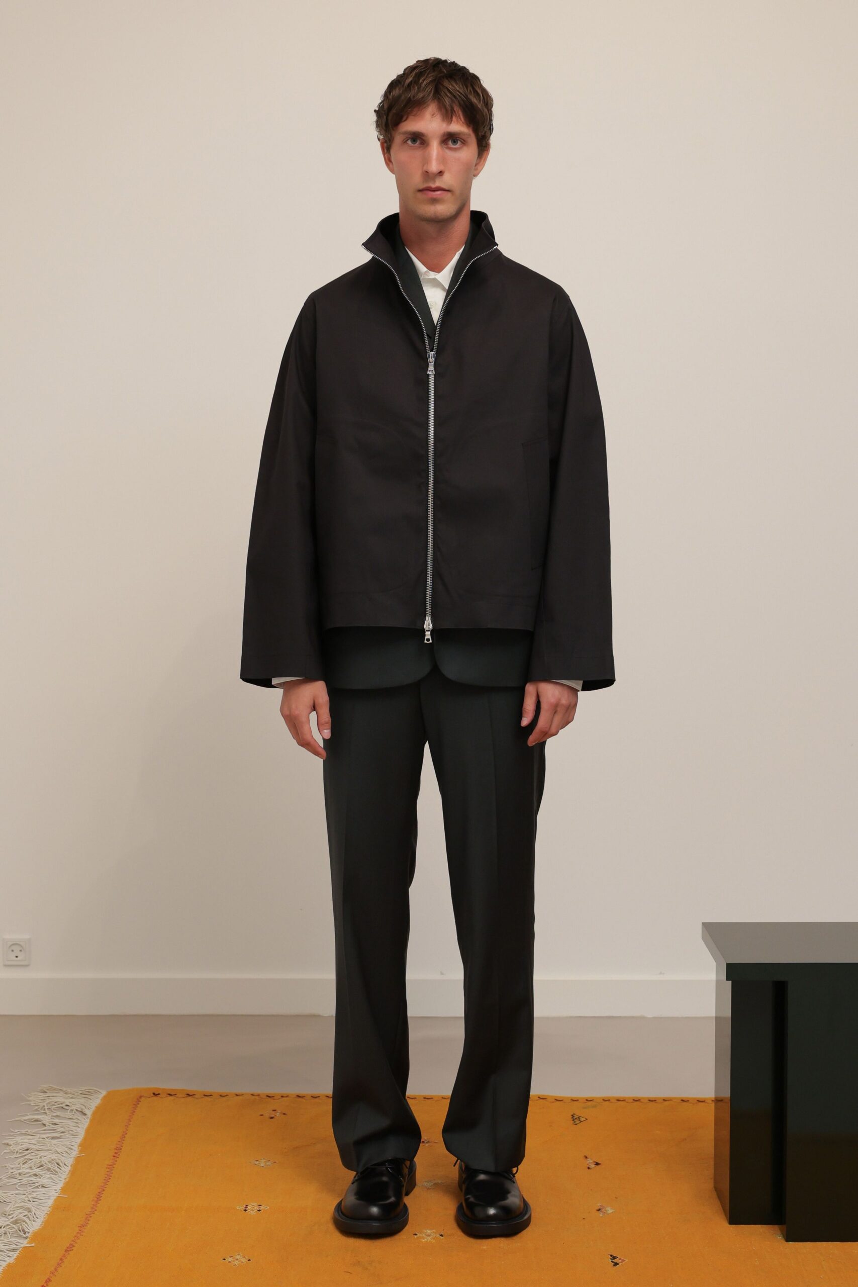 black cotton long-sleeve high-neck oversized structured zippered jacket