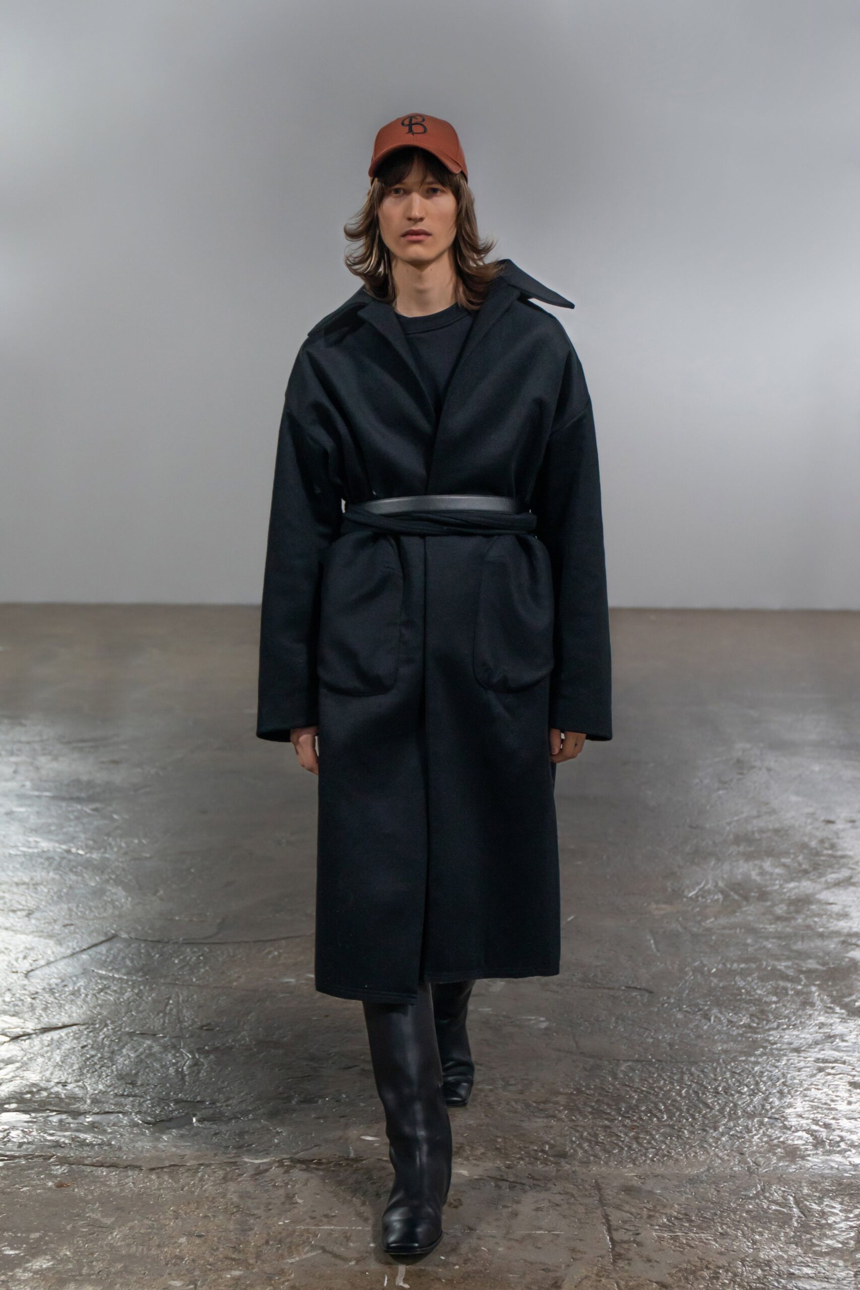 black wool coat with hat and boots