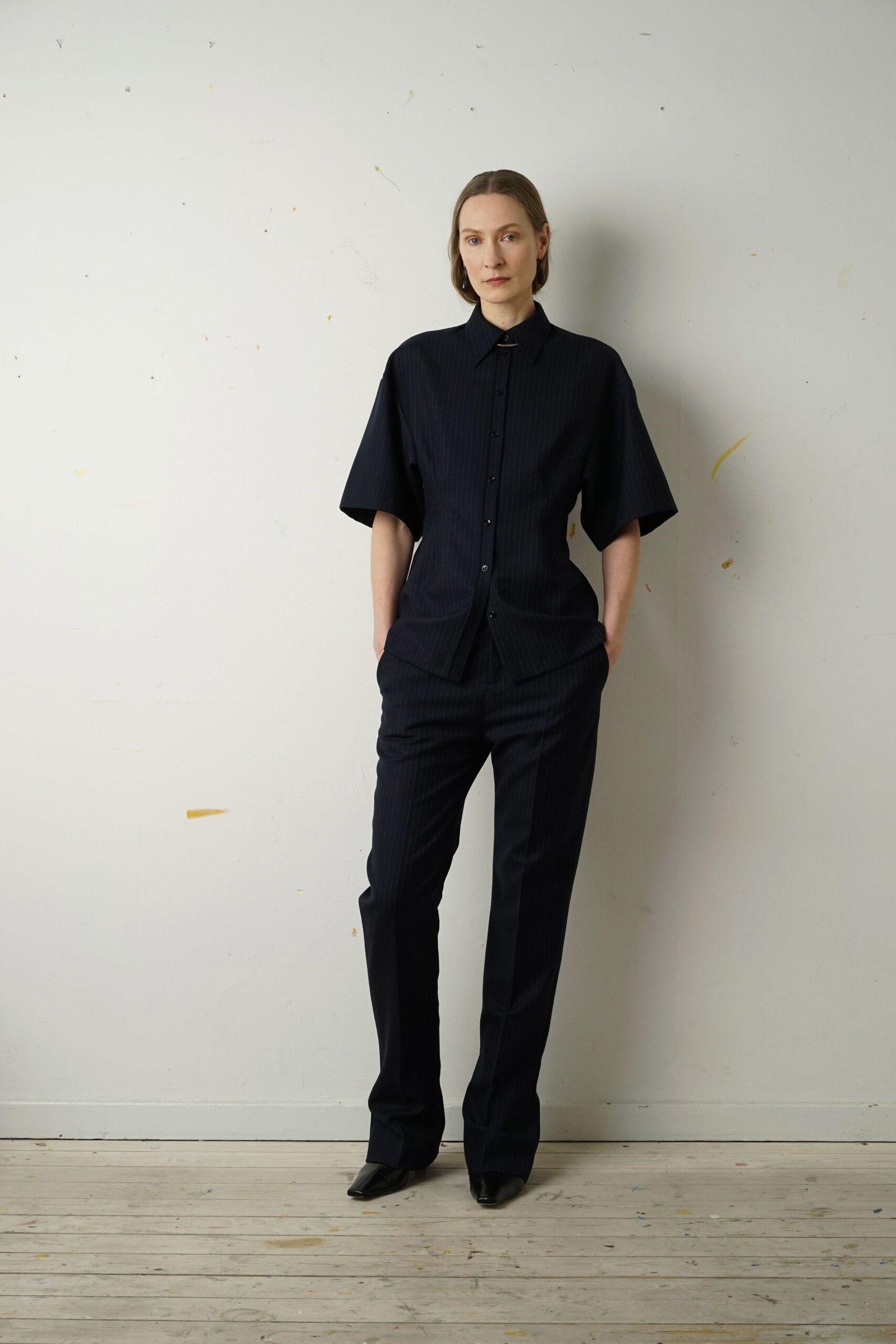 black relaxed shirt and tailored pants