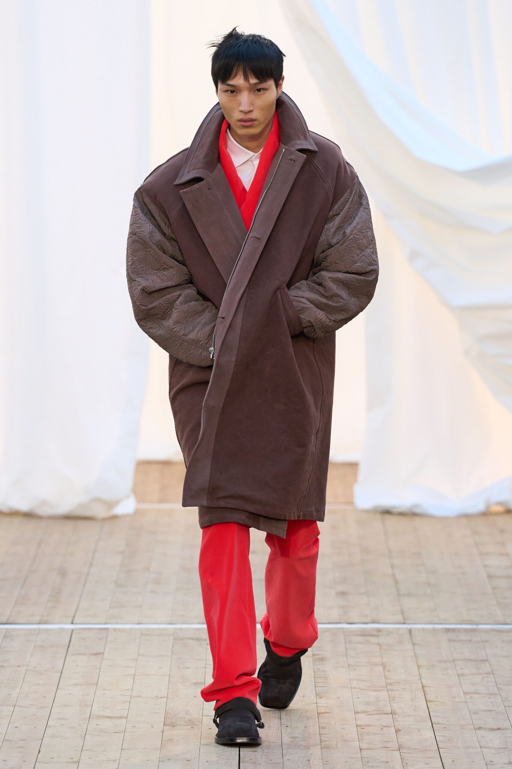 brown oversized coat with red pants