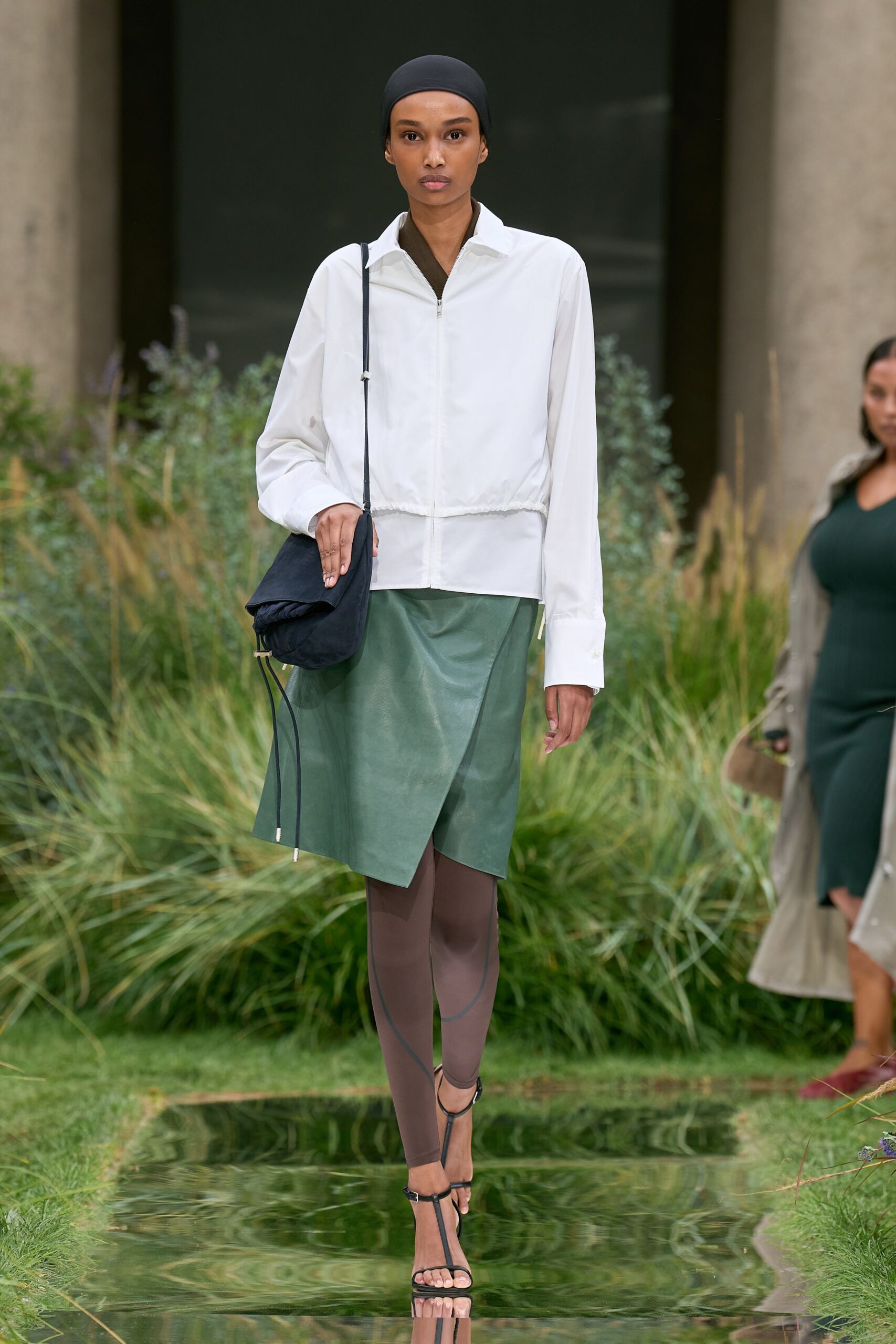white fitted jacket with green skirt