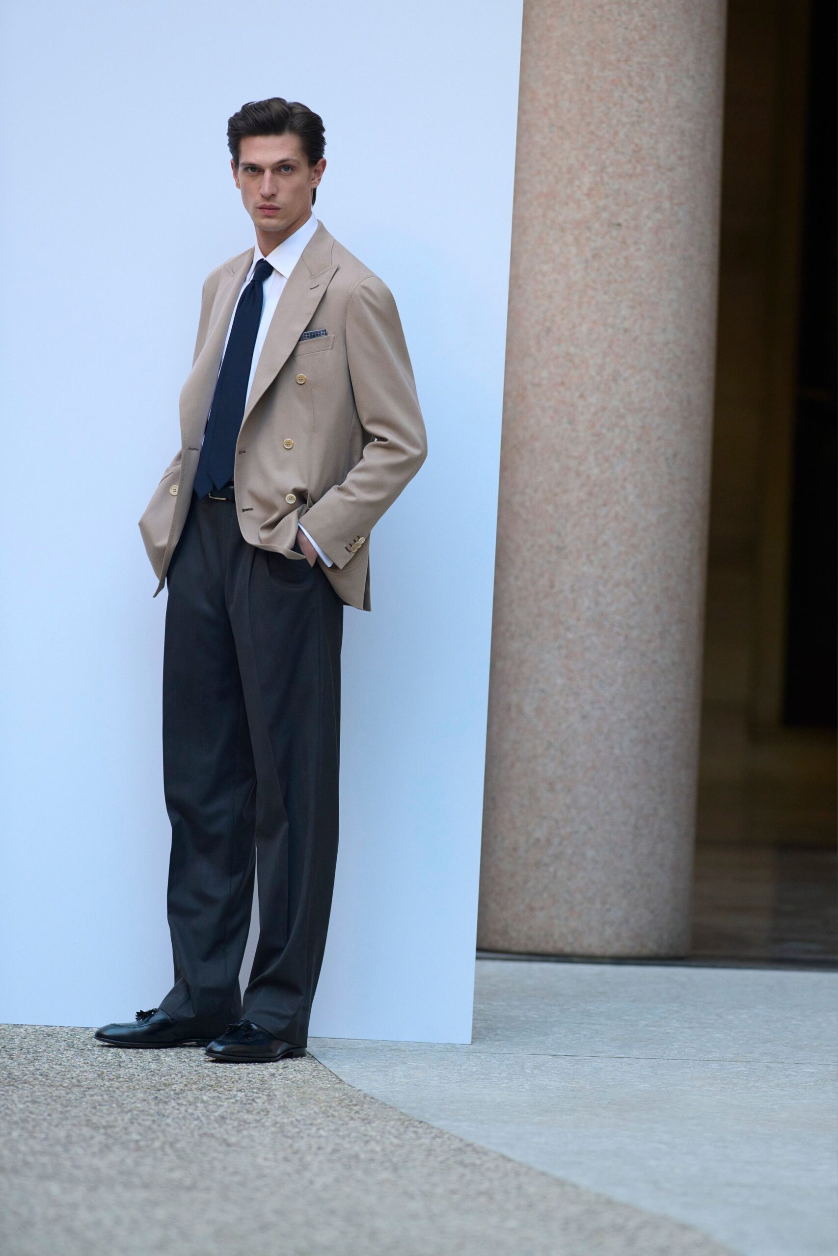 beige tailored blazer with gray pants