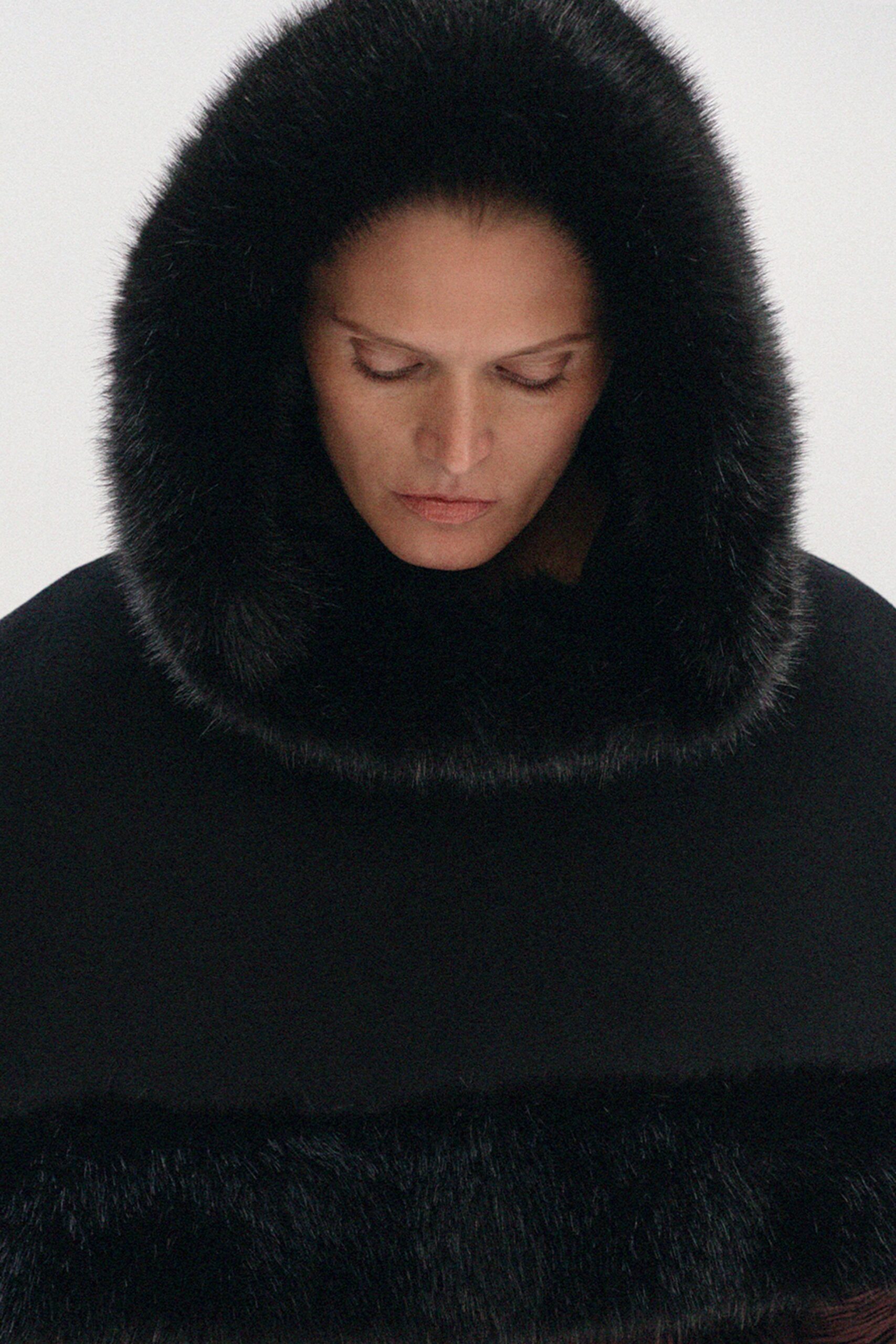 black fur hooded cape