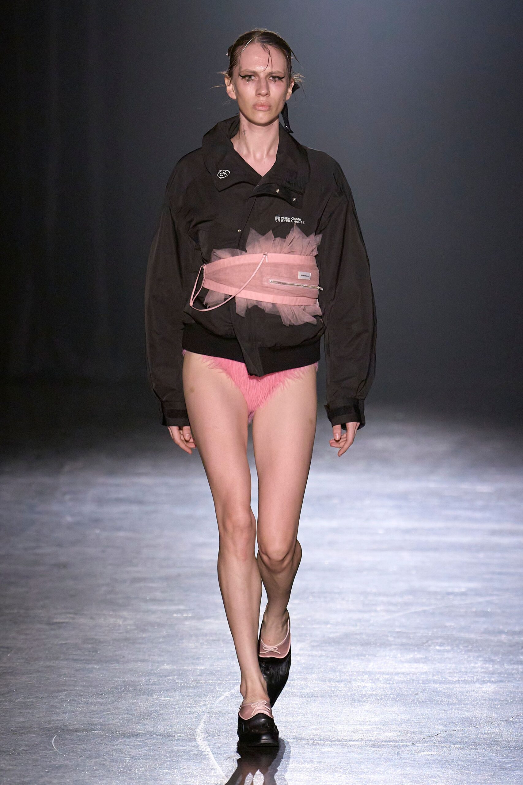 black jacket pink tulle shorts