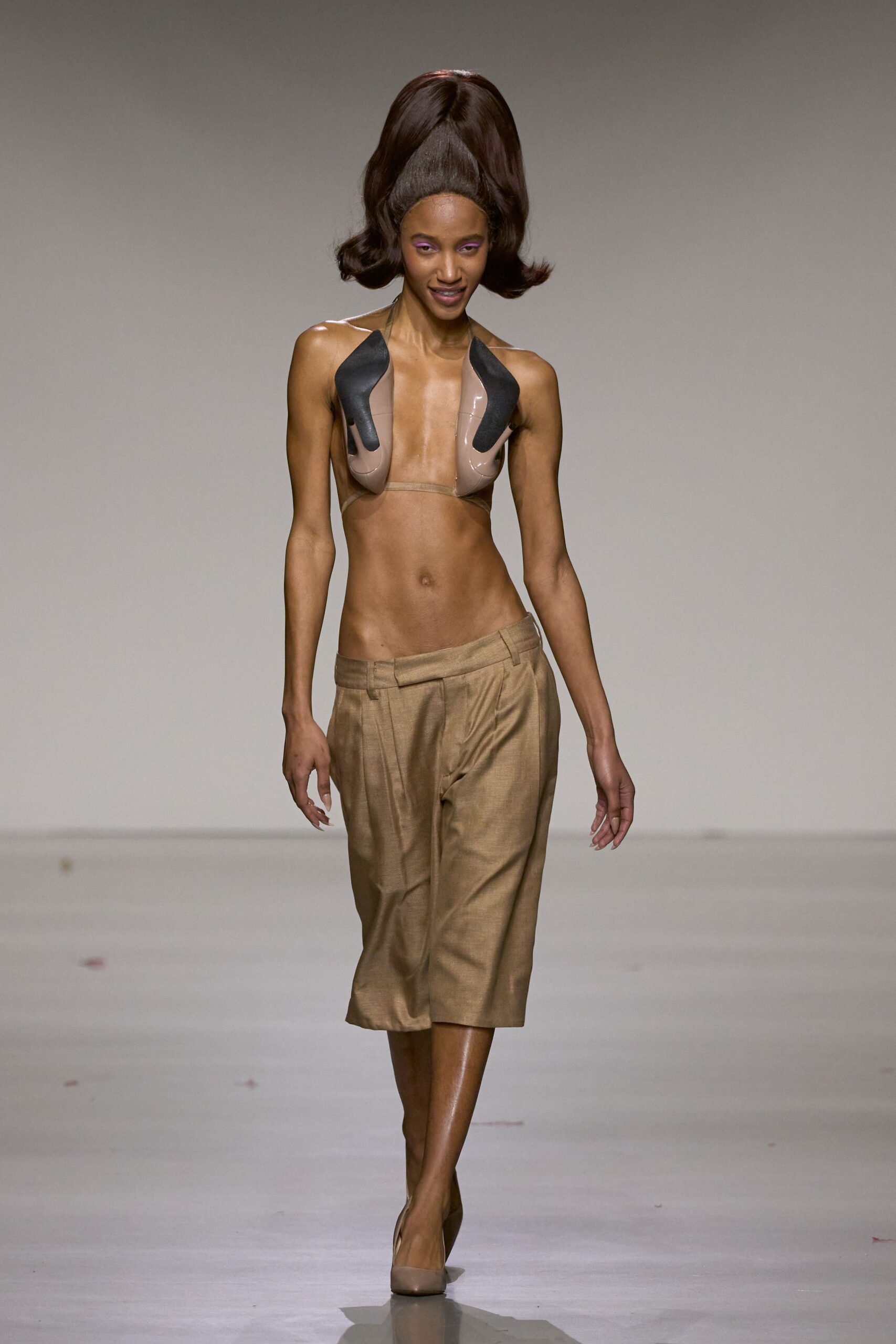 black vinyl top beige pants