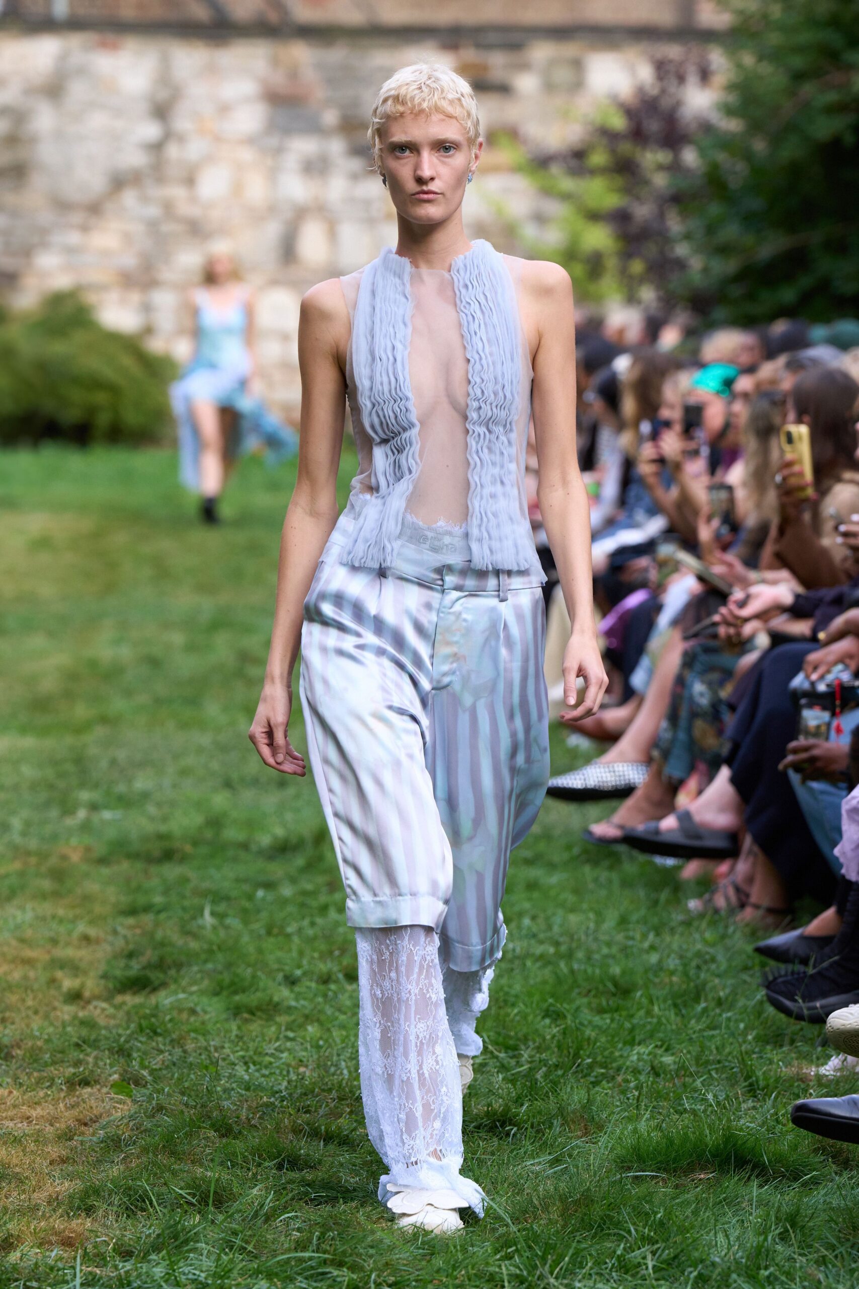 blue ruffled top white pants