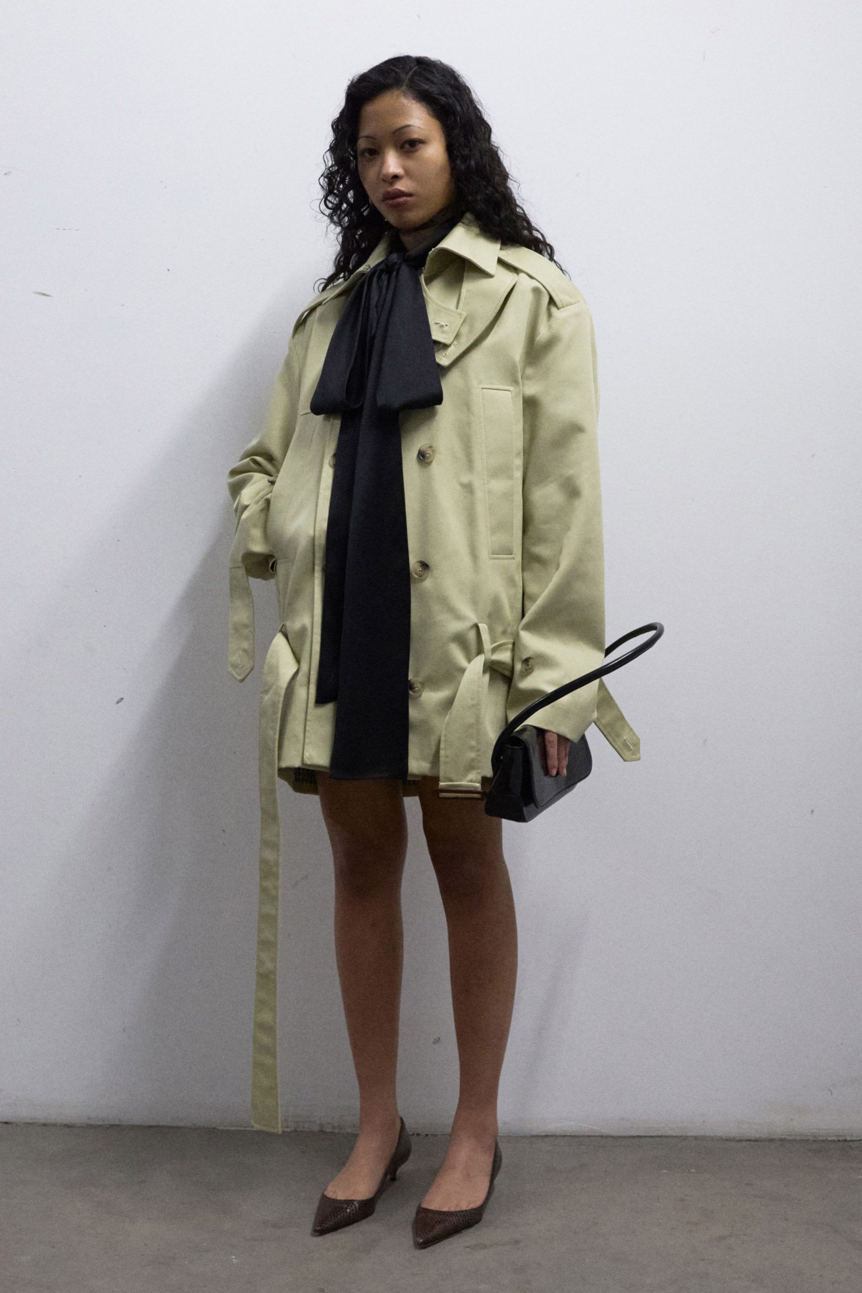 beige cotton long-sleeve collared oversized zippered belted coat