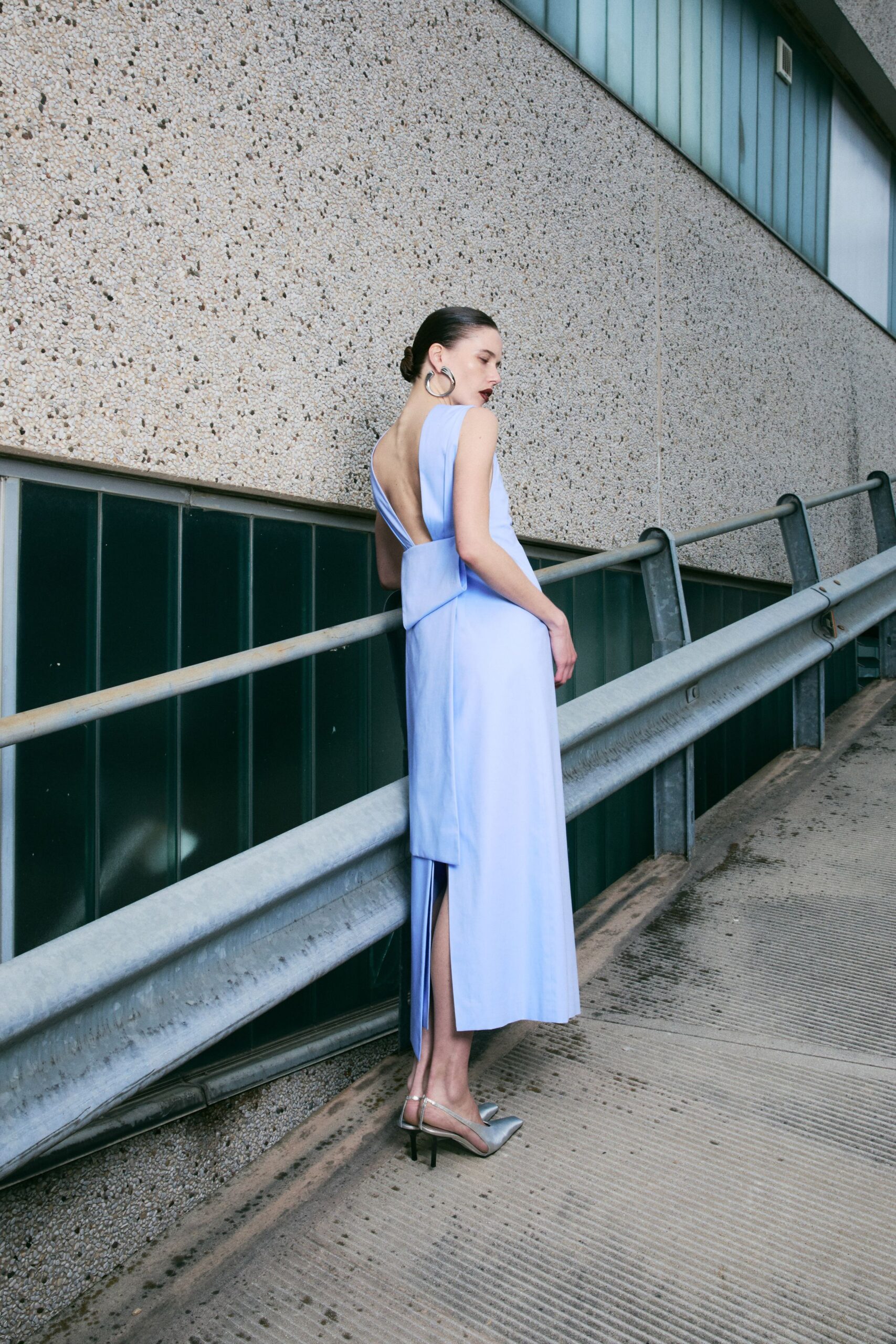 blue silk sleeveless v-neck fitted draped flowing dress