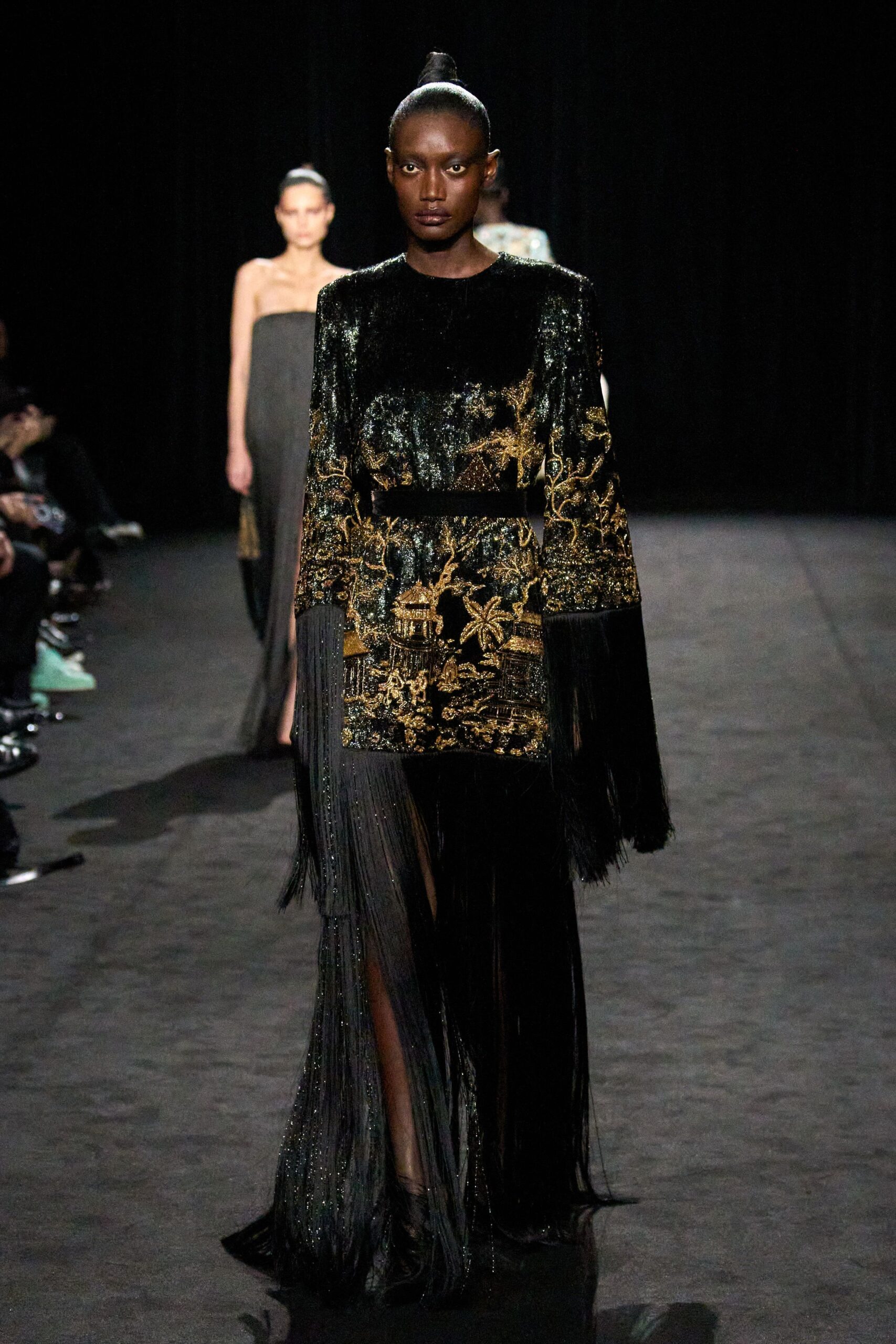 black and gold embroidered gown
