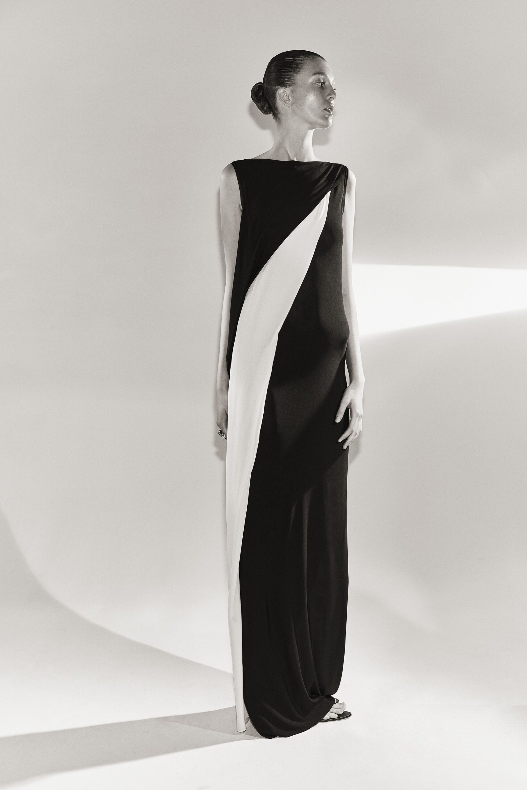 black and white draped gown