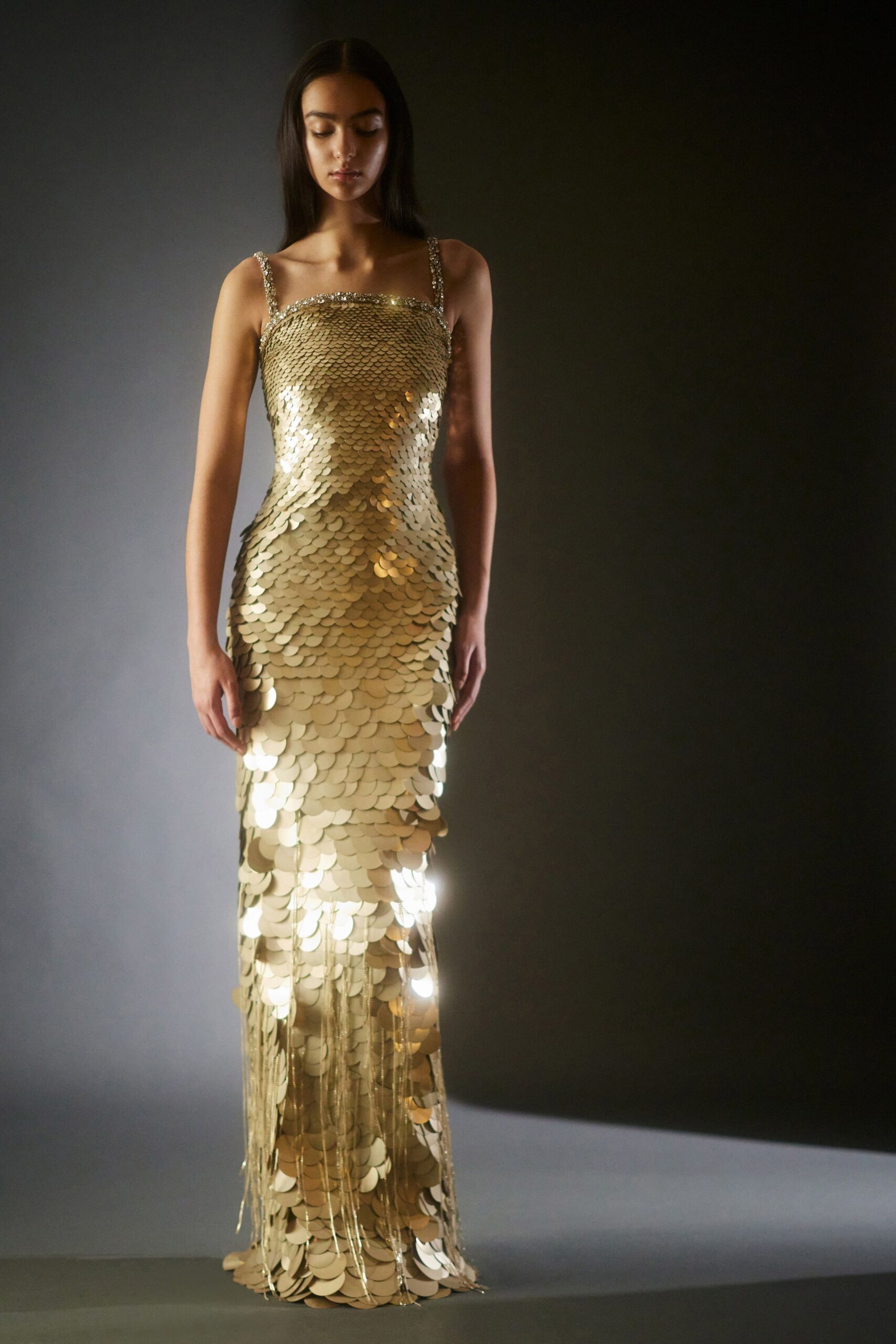 gold sequin sleeveless gown