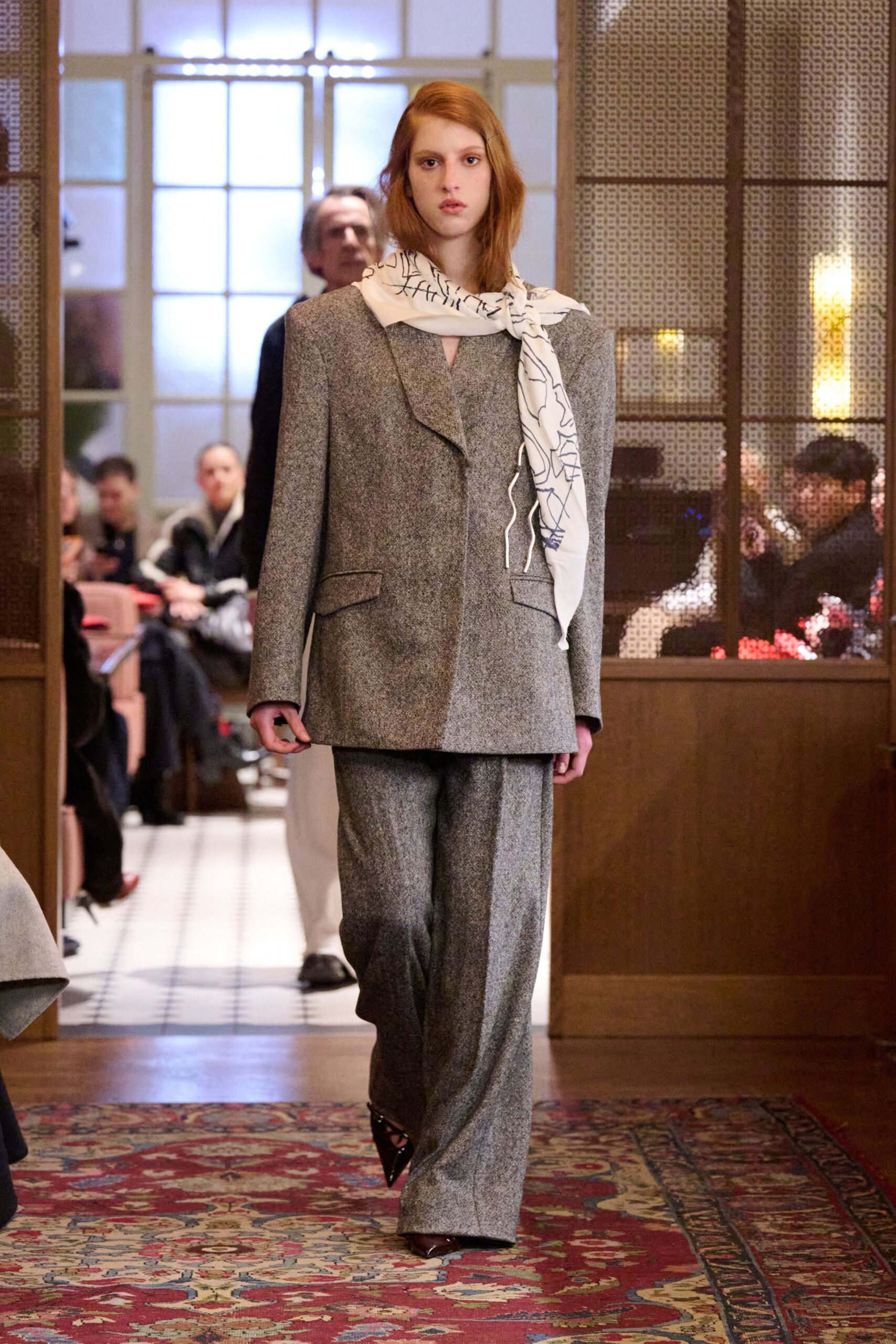 gray tailored suit with scarf