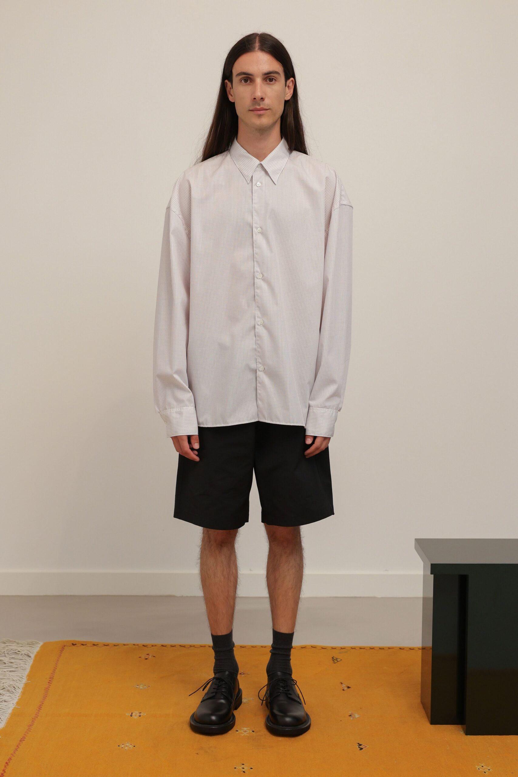 oversized printed shirt with black shorts