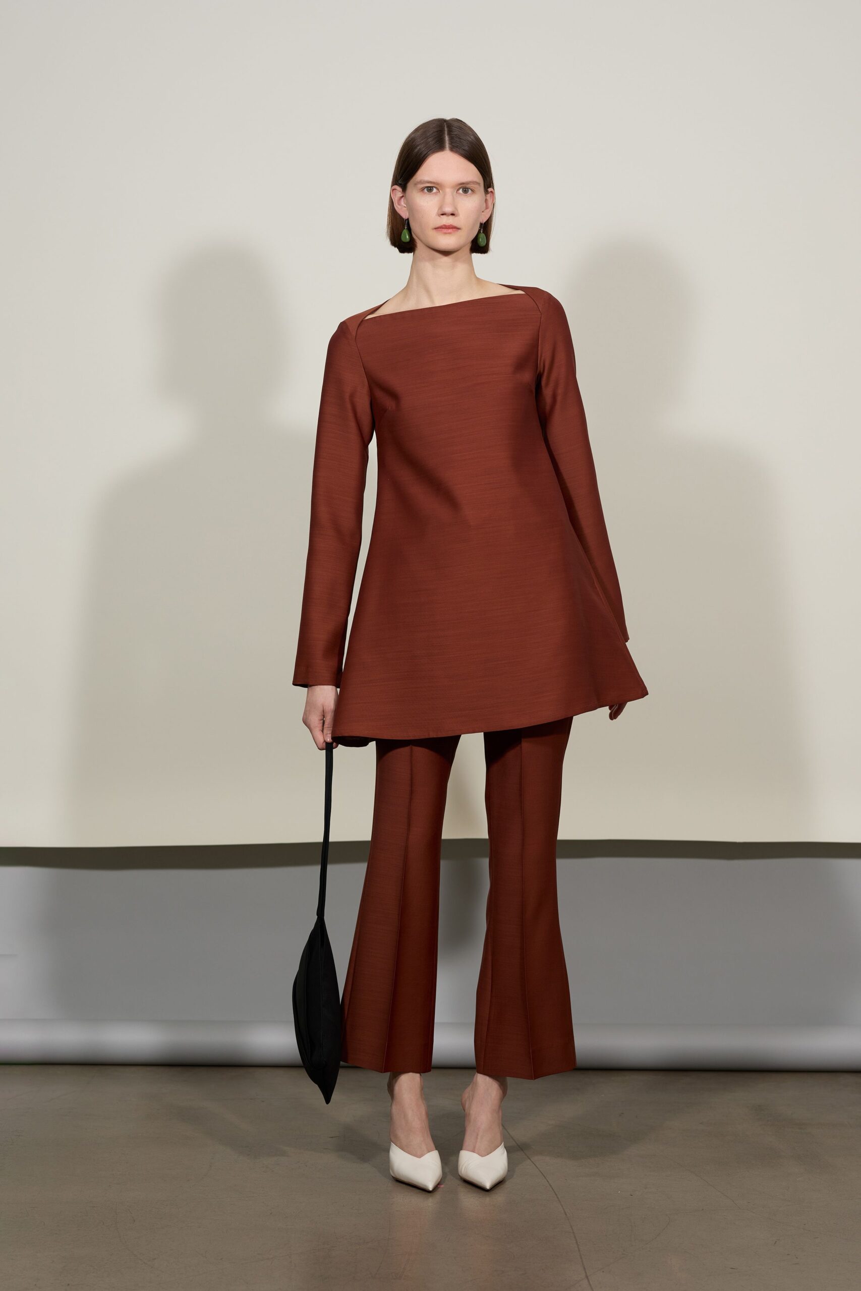 brown relaxed top with flared pants