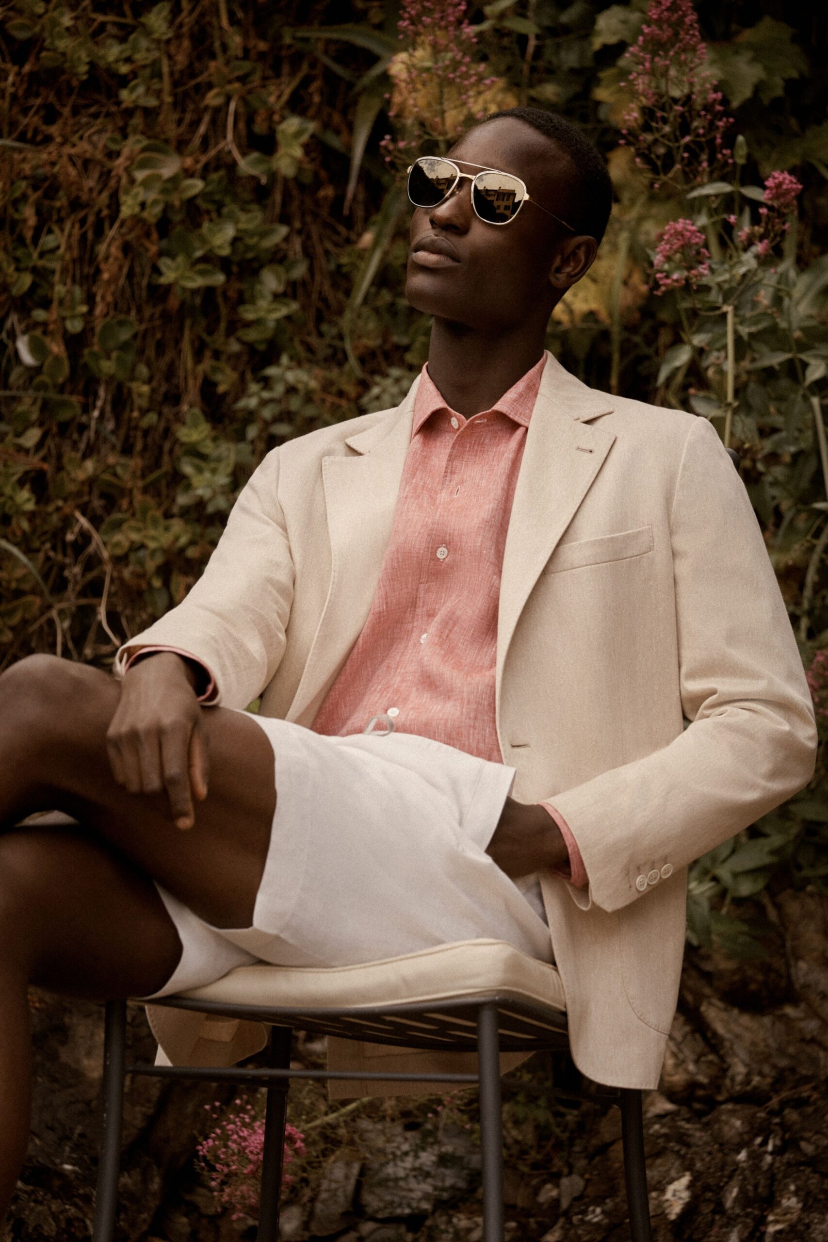 beige blazer pink shirt white shorts