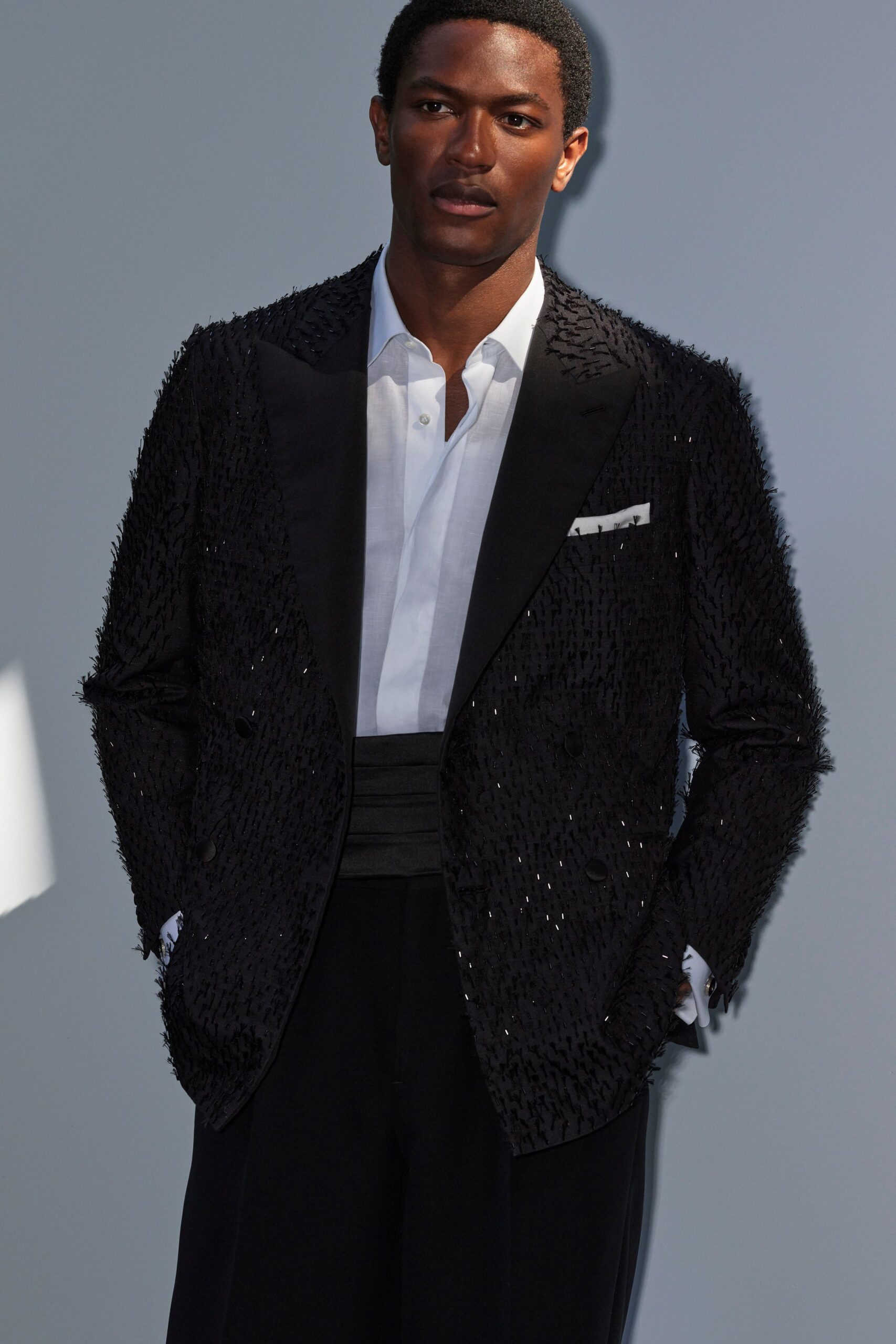 black beaded blazer with white shirt