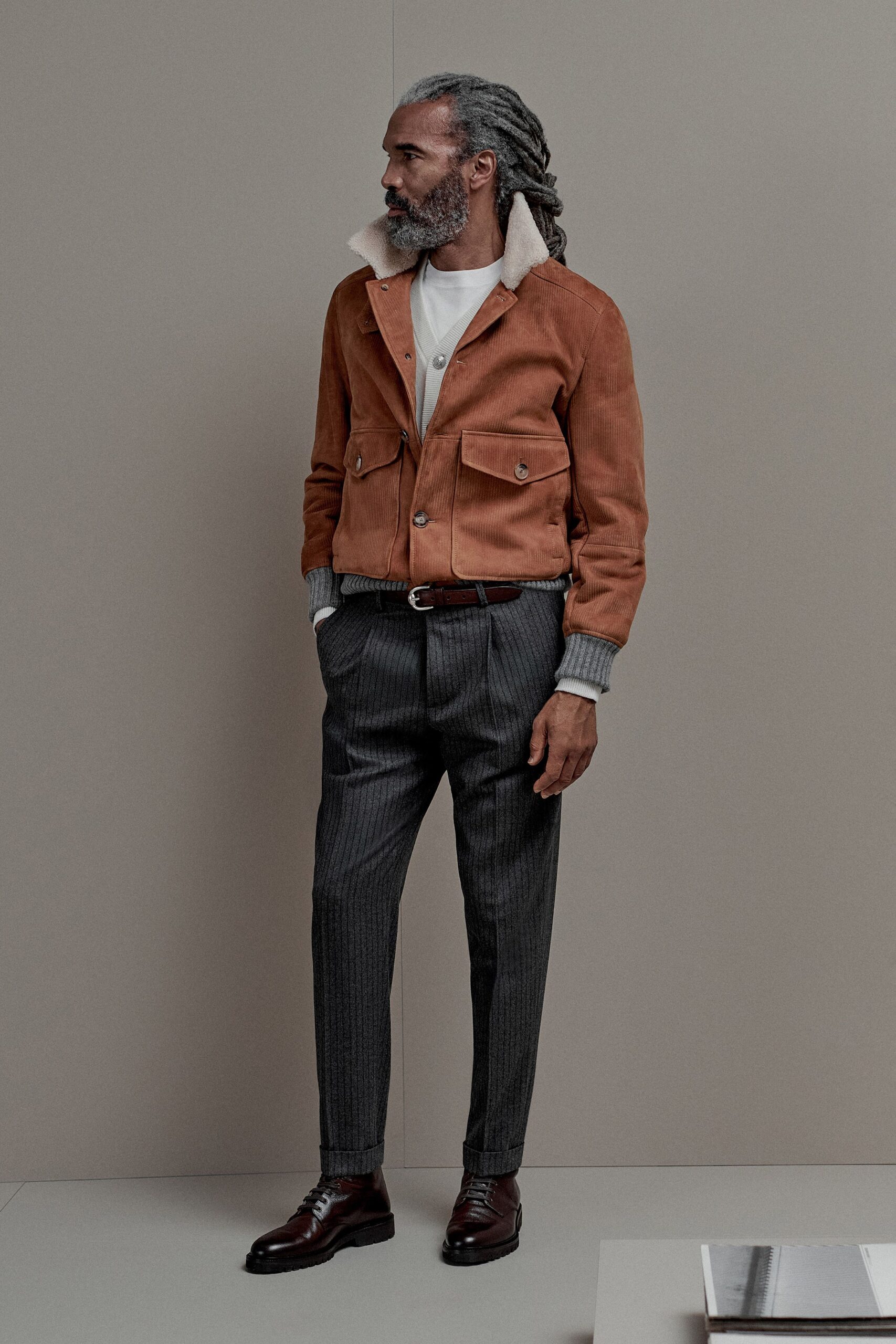 brown suede jacket with tailored pants