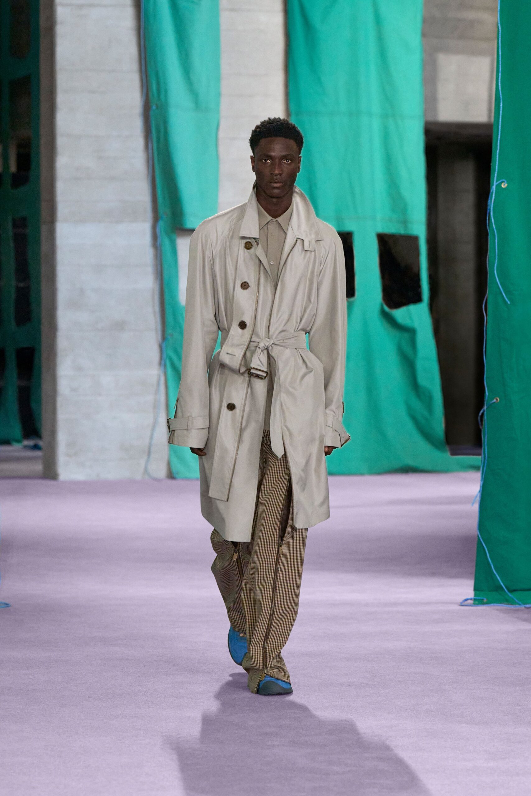 beige trench coat with brown checked pants