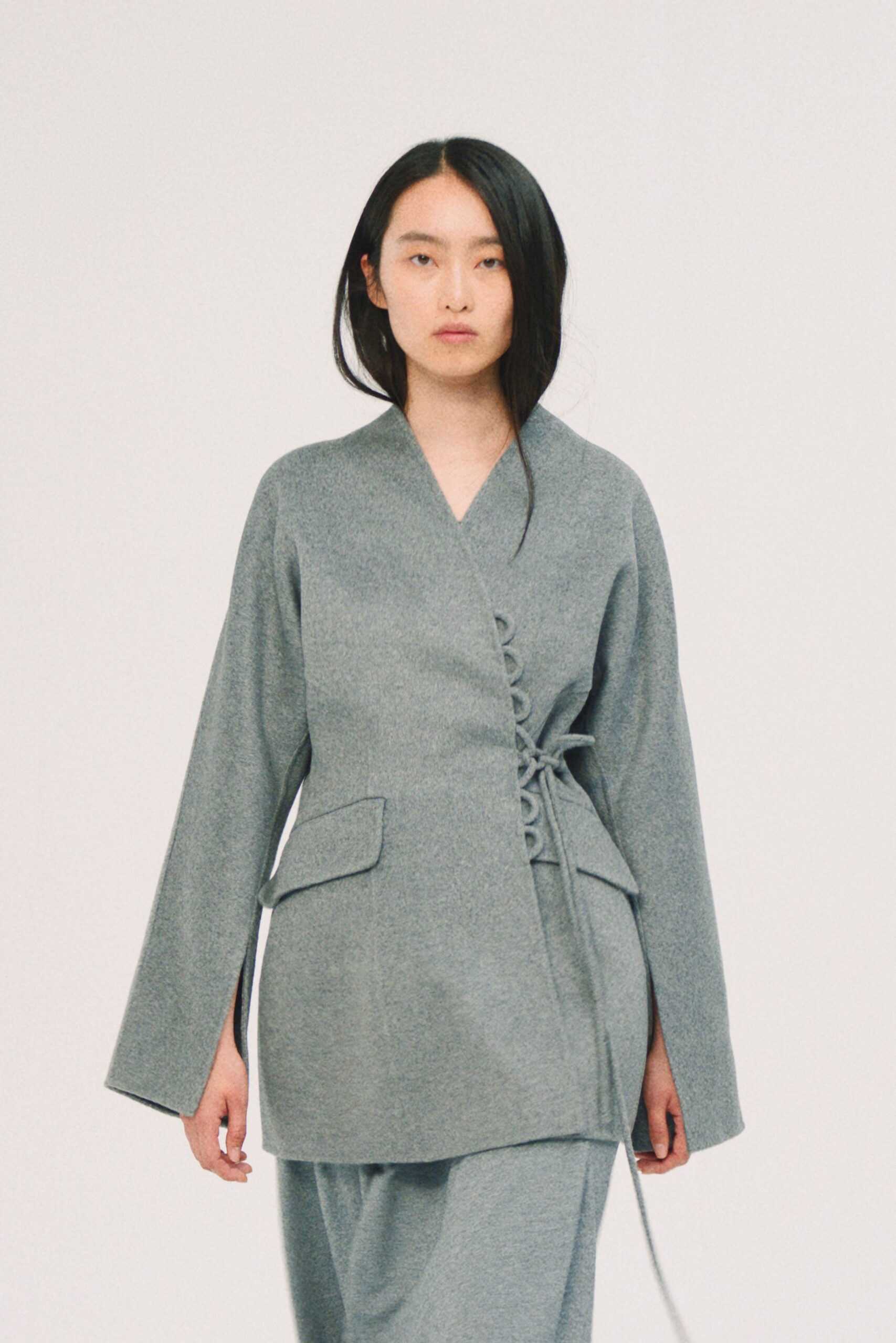 gray wool long-sleeve collared relaxed buttoned jacket