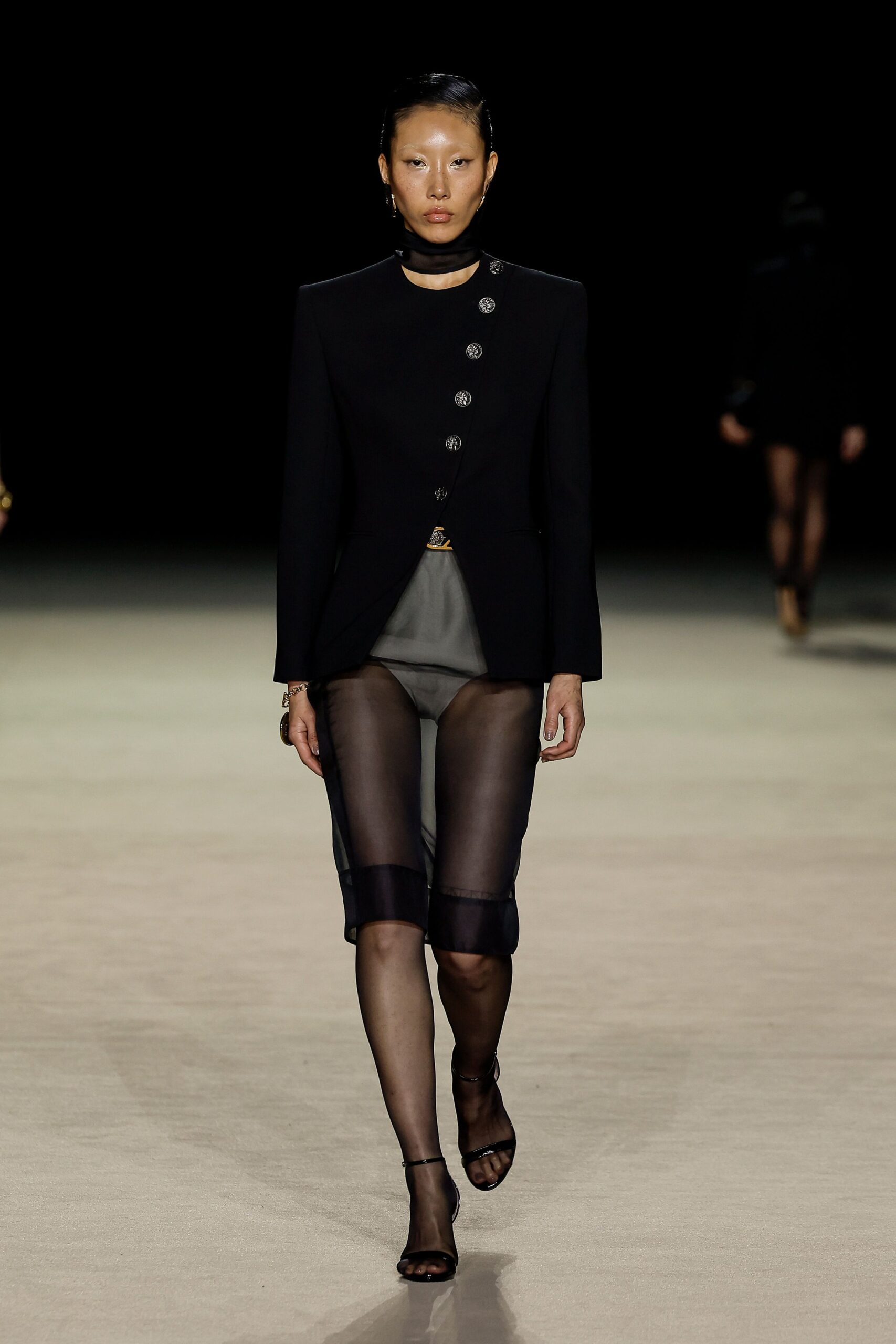 black blazer with gray shorts