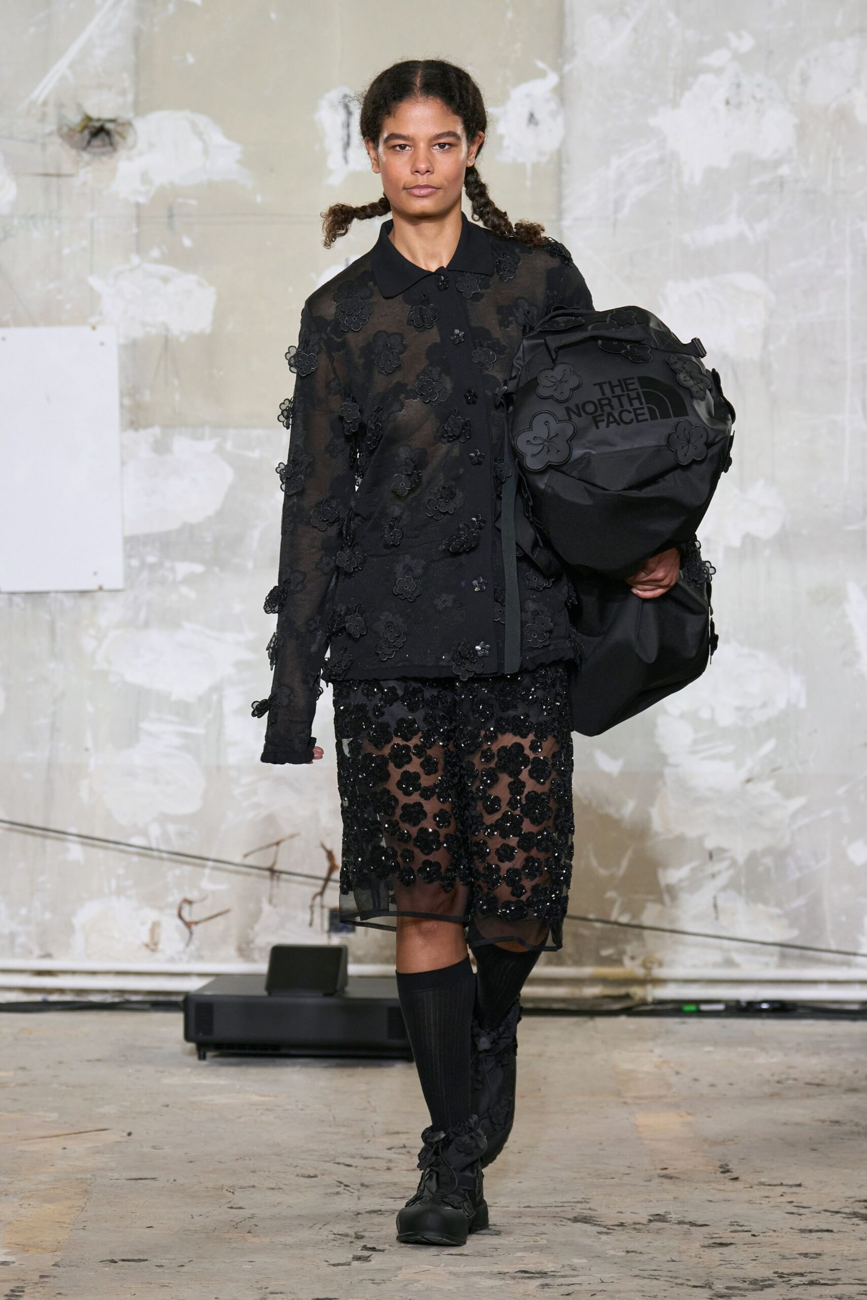 black embroidered top and skirt
