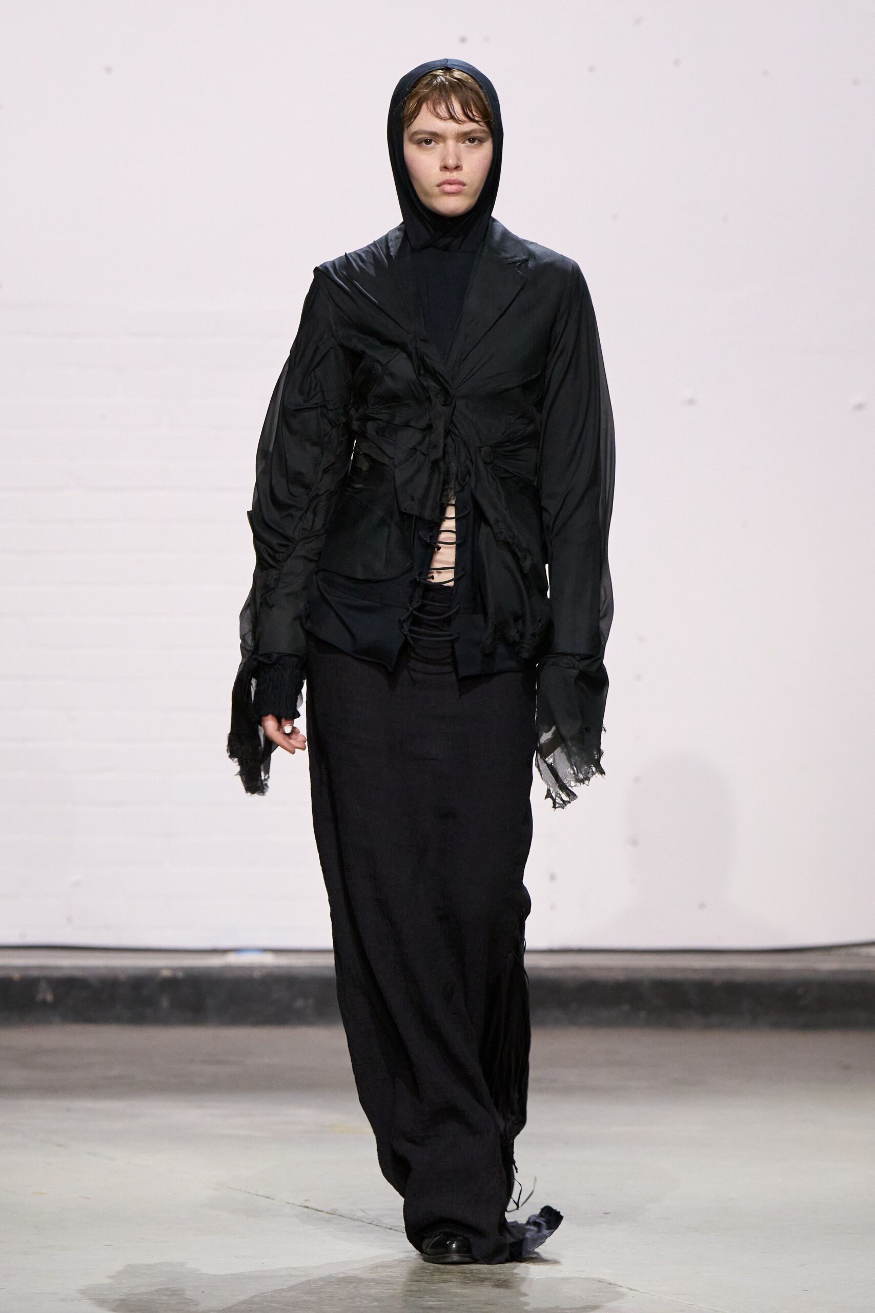 black fitted top and relaxed pants