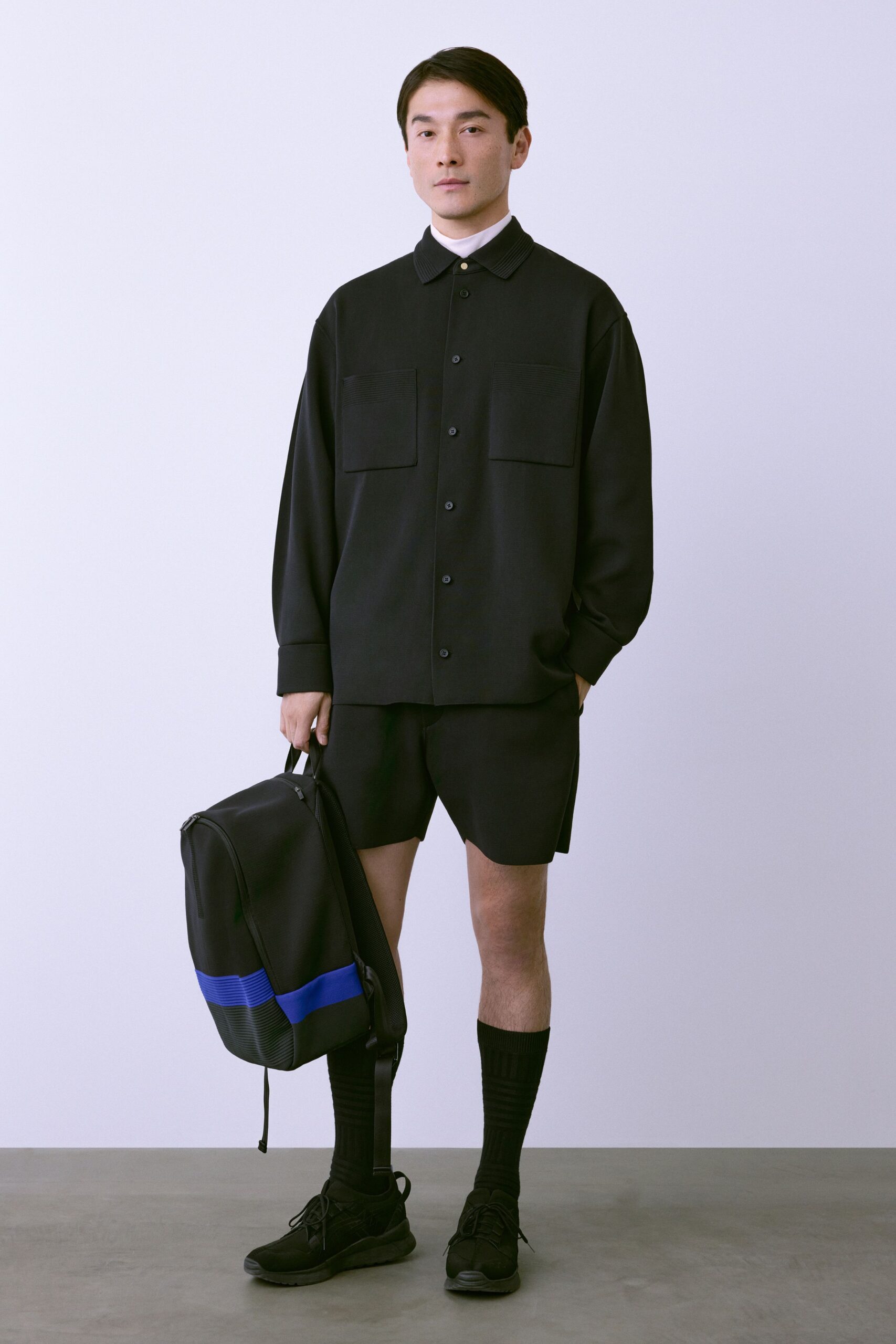 black relaxed shirt and shorts
